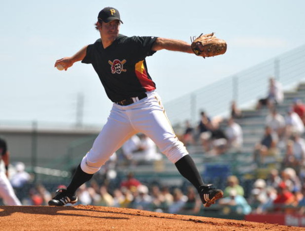 BRADENTON, FL - MARCH 8:  Pitcher Ross Ohlendorf #49 of the Pittsburgh Pirates starts against the Houston Astros March 8, 2009 at McKechnie Field in Bradenton, Florida.  (Photo by Al Messerschmidt/Getty Images)