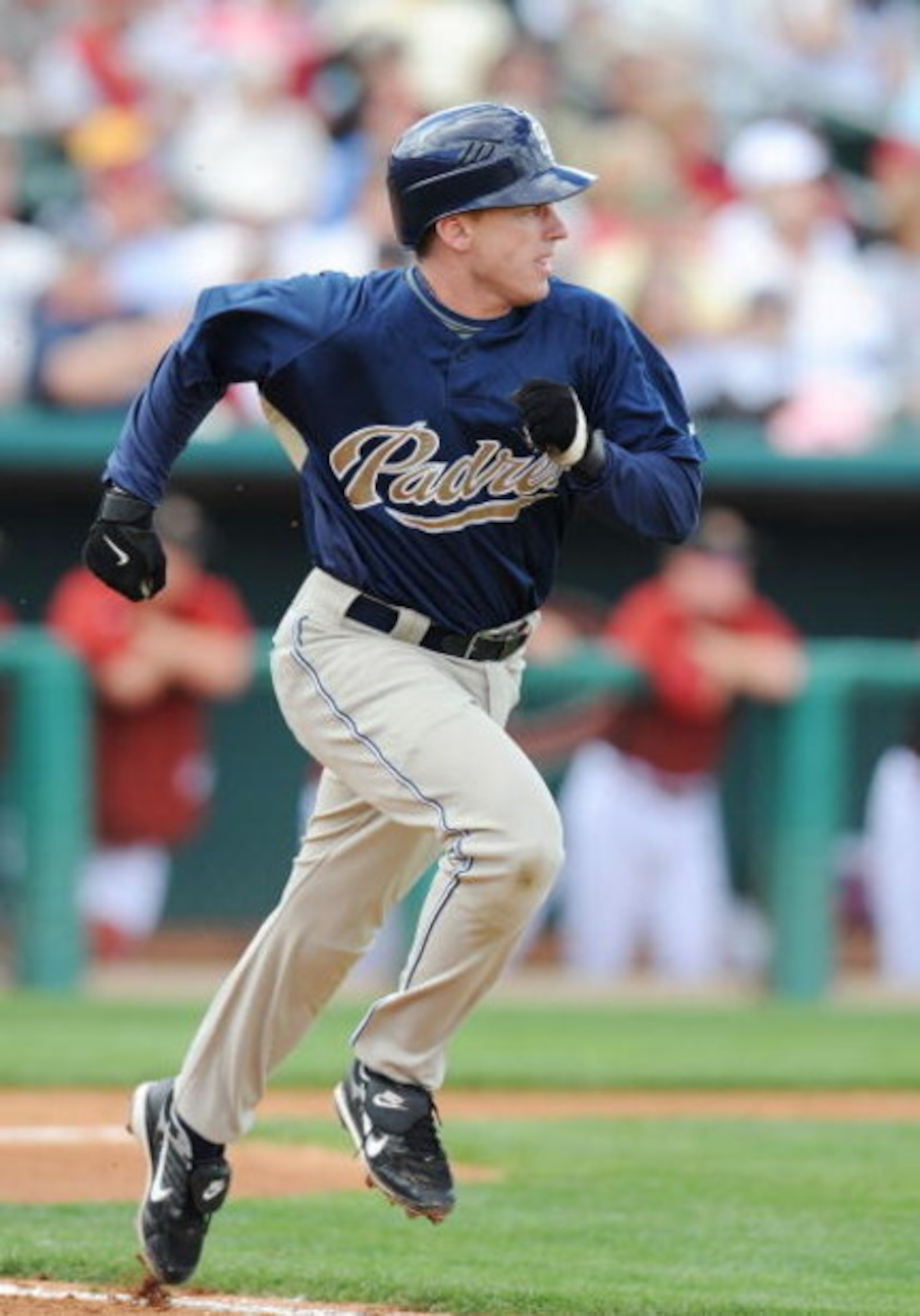 TUCSON, AZ - MARCH 09:   David Eckstein #3 of the San Diego Padres runs to first base during a Spring Training game against the Arizona Diamondbacks at Tucson Electric Park on March 9, 2009 in Tucson, Arizona.  (Photo by Lisa Blumenfeld/Getty Images)