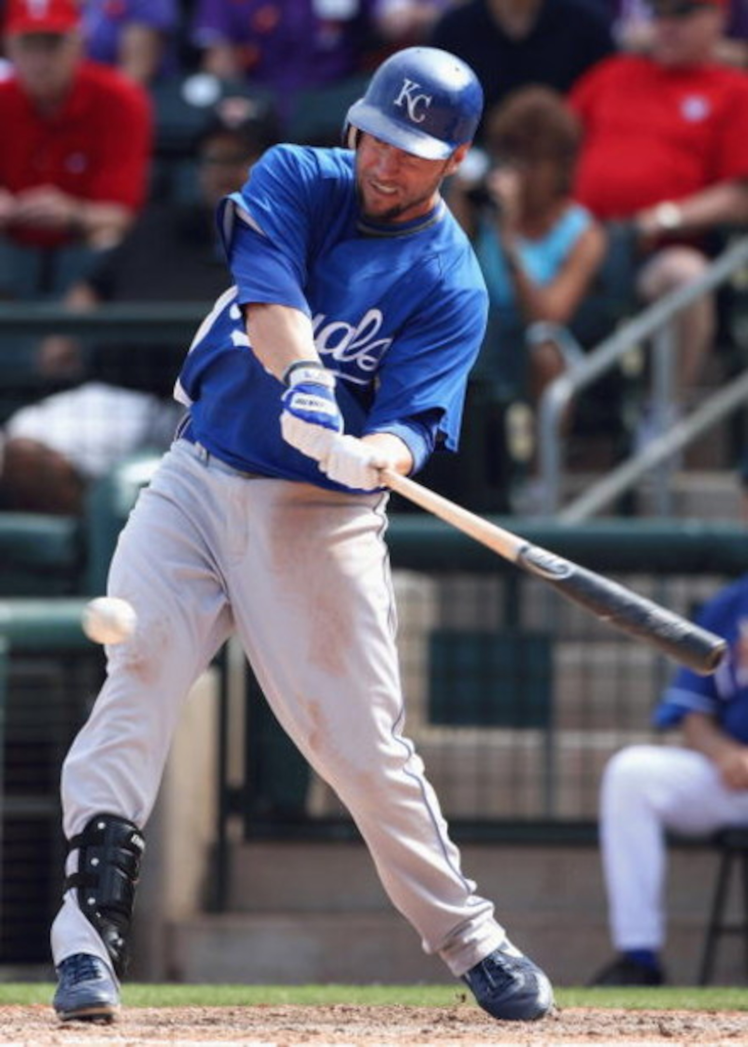SURPRISE, AZ - MARCH 04:  Ross Gload #7 of the Kansas City Royals bats against the Texas Rangers during the spring training game at Surprise Stadium on March 4, 2009 in Surprise, Arizona. The Rangers defeated the Royals 5-3.  (Photo by Christian Petersen/