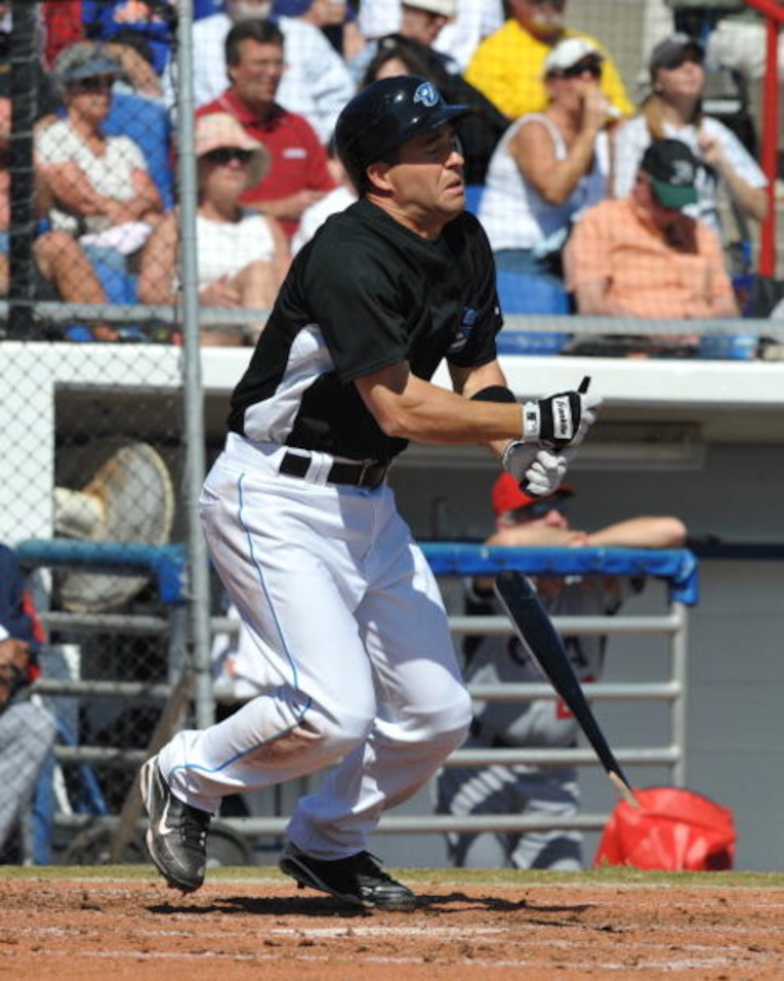 DUNEDIN, FL - MARCH 4: Infielder John McDonald #6 of the Toronto Blue Jays breaks a bat against the USA World Baseball team in an exhibition game on March 4, 2009 at Dunedin Stadium in Dunedin, Florida.  (Photo by Al Messerschmidt/Getty Images)