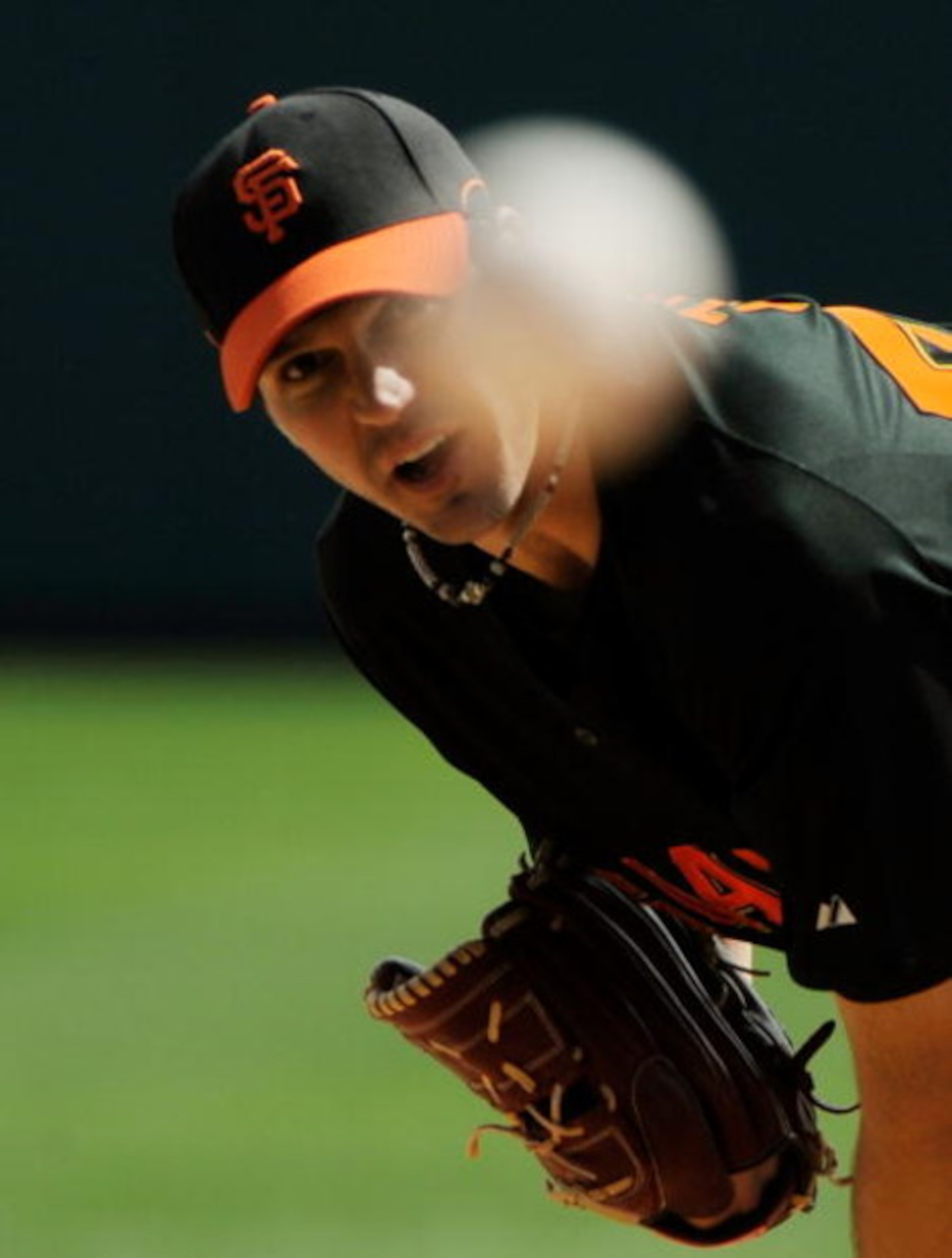 GLENDALE, AZ - MARCH 04:  Barry Zito #75 of the San Francisco Giants follows through on a pitch as he warms up before the start of a spring training game against the Los Angeles Dodgers on March 4, 2009, in Glendale, Arizona.  (Photo by Kevork Djansezian/