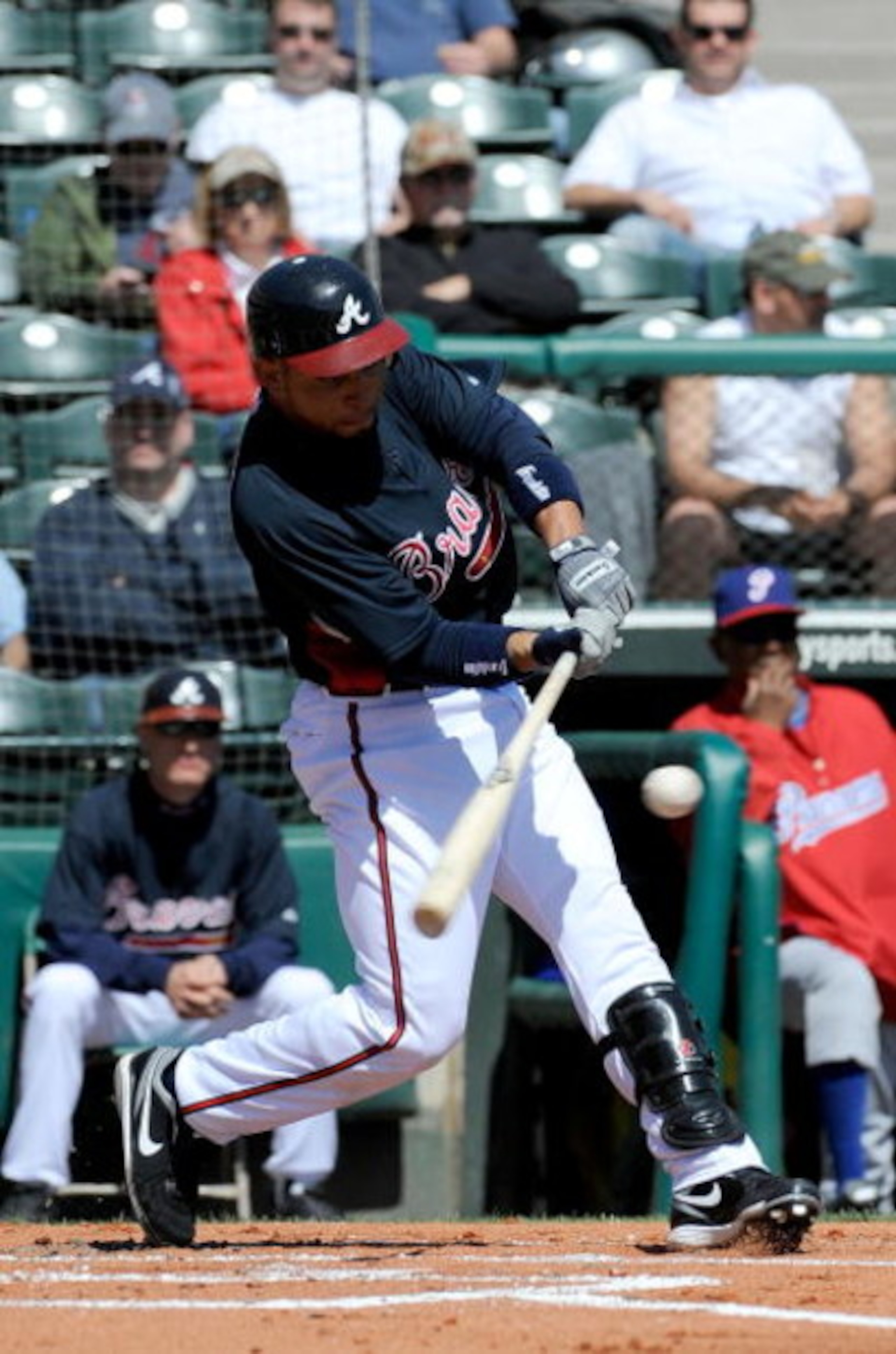 KISSIMMEE, FL - MARCH 3:  Omar Infante #4 of the Atlanta Braves hits during an exhibition game against Panama at Champion Stadium March 3, 2009 in Kissimmee, Florida.  (Photo by Sam Greenwood/Getty Images)