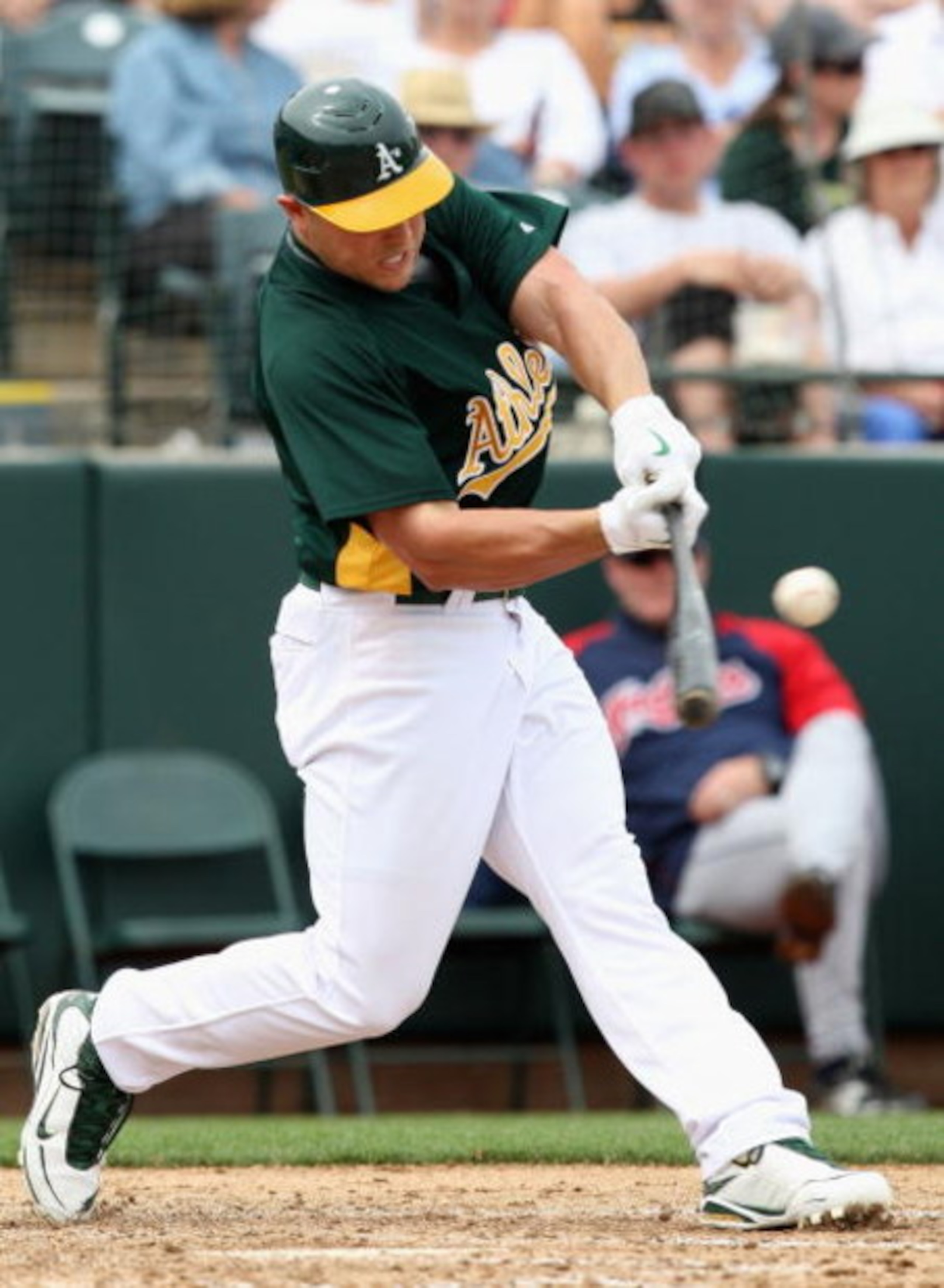 TEMPE, AZ - MARCH 08:  Matt Holliday #5 of the Oakland Athletics bats against the Cleveland Indians during the spring training game at Phoenix Municipal Stadium on March 8, 2009 in Tempe, Arizona. The A's defeated the Indians 8-5.  (Photo by Christian Pet