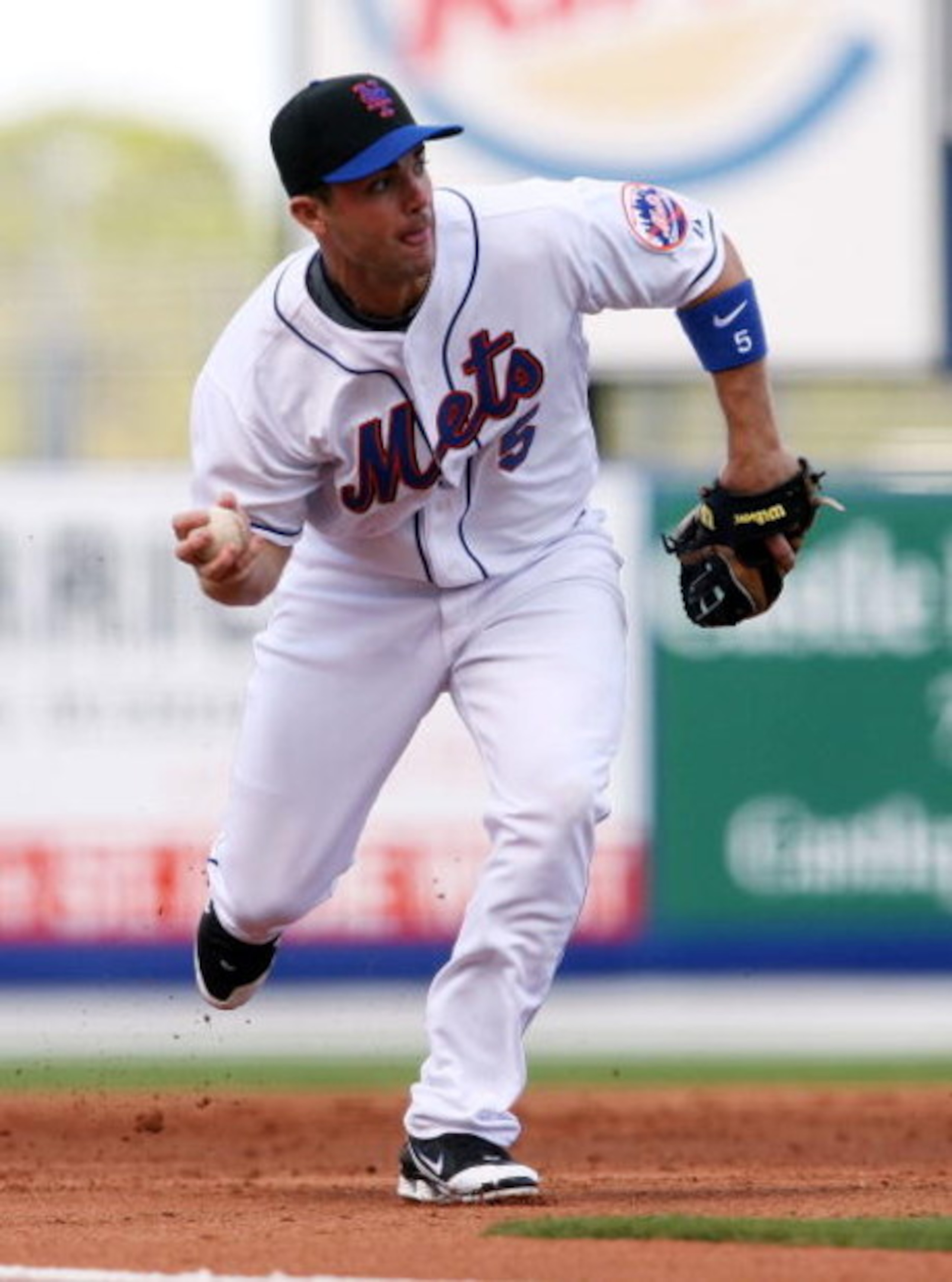 PORT ST LUCIE, FL - FEBRUARY 26:  Third baseman David Wright #5 of the New York Mets fields a ground ball against the Florida Marlins during a spring training game at Tradition Field on February 26, 2009 in Port St Lucie, Florida. The Mets defeated the Ma