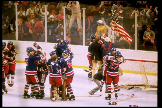 24 Feb 1980: Team USA celebrate after defeating Finland to win the gold medal game of the Winter Olympics in Lake Placid, New York. The USA won the game 4-2 and the gold medal.