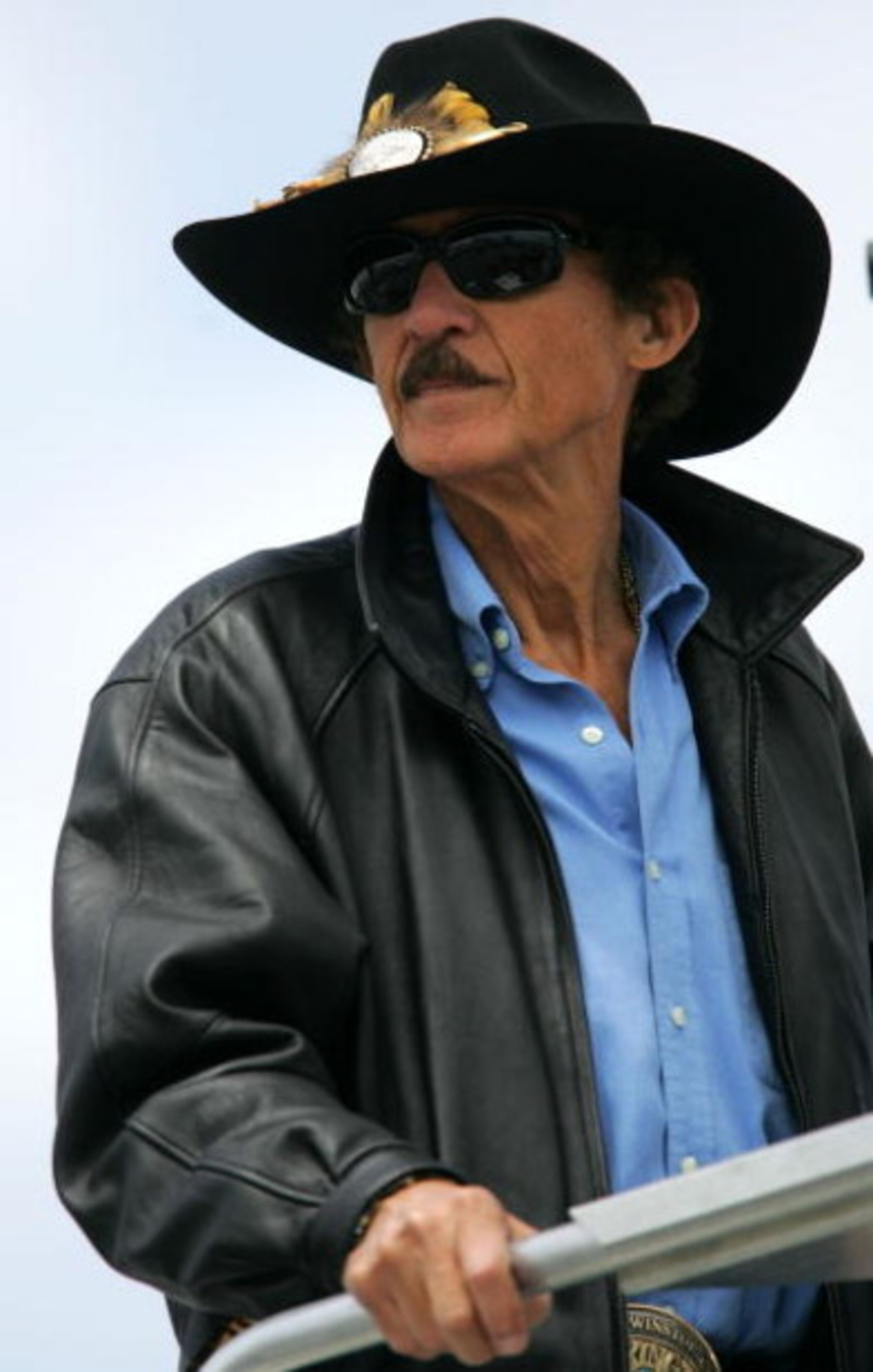 RICHMOND, VA - MAY 04: Former NASCAR Champion Richard Petty watches practice for the NASCAR Nextel Cup Series Jim Stewart 400 at Richmond International Raceway on May 4, 2007 in Richmond, Virginia. (Photo by Chris Trotman/Getty Images for NASCAR) RICHMOND, VA - MAY 04: Former NASCAR Champion Richard Petty watches practice for the NASCAR Nextel Cup Series Jim Stewart 400 at Richmond International Raceway on May 4, 2007 in Richmond, Virginia. (Photo by Chris Trotman/Getty Images for NASCAR)