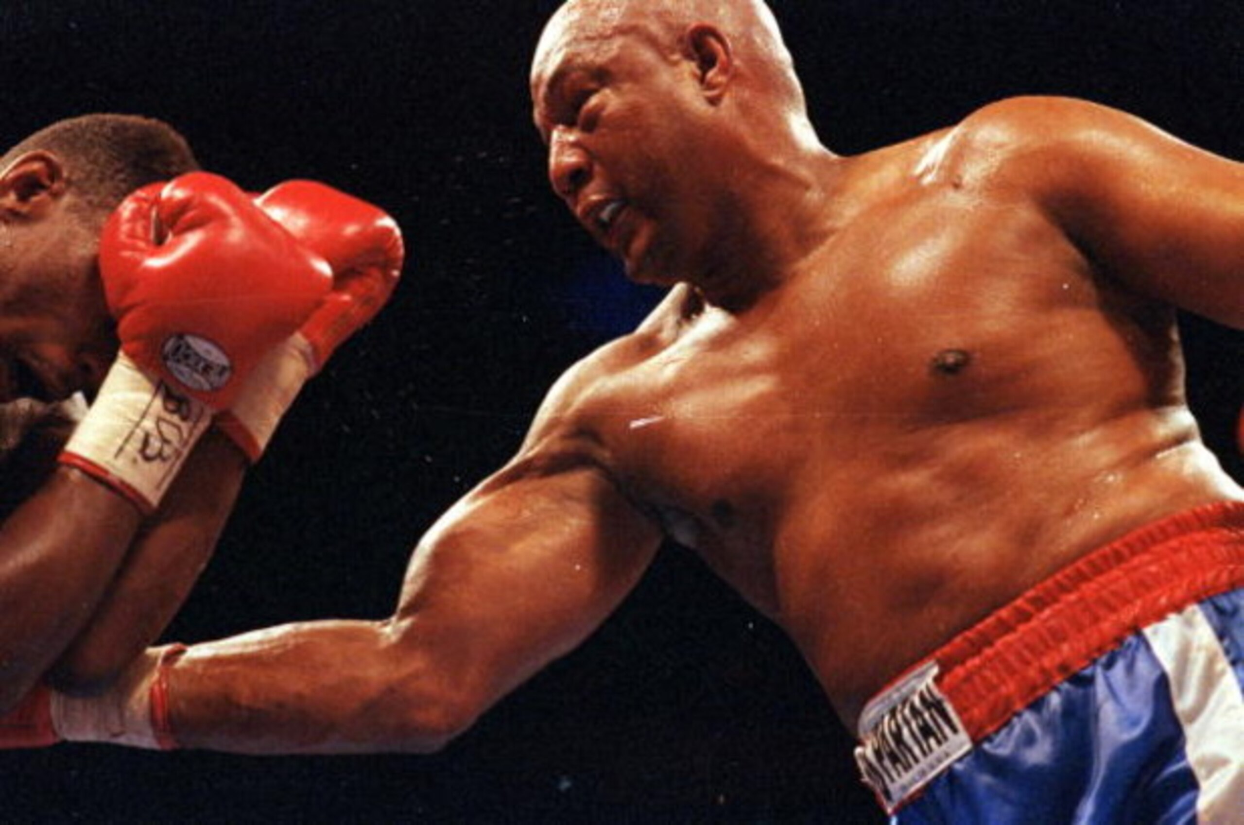 11 Apr 1992: George Foreman makes a right puch during a fight against Alex Stewart. Mandatory Credit: Holly Stein /Allsport 11 Apr 1992: George Foreman makes a right puch during a fight against Alex Stewart. Mandatory Credit: Holly Stein /Allsport