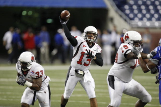 DETROIT - DECEMBER 5:  Quarterback Nate Davis #13 of the Ball State Cardinals throws a pass against the Buffalo Bulls during the MAC Championship game on December 5, 2008 at Ford Field in Detroit Michigan. (Photo by: Gregory Shamus/Getty Images)