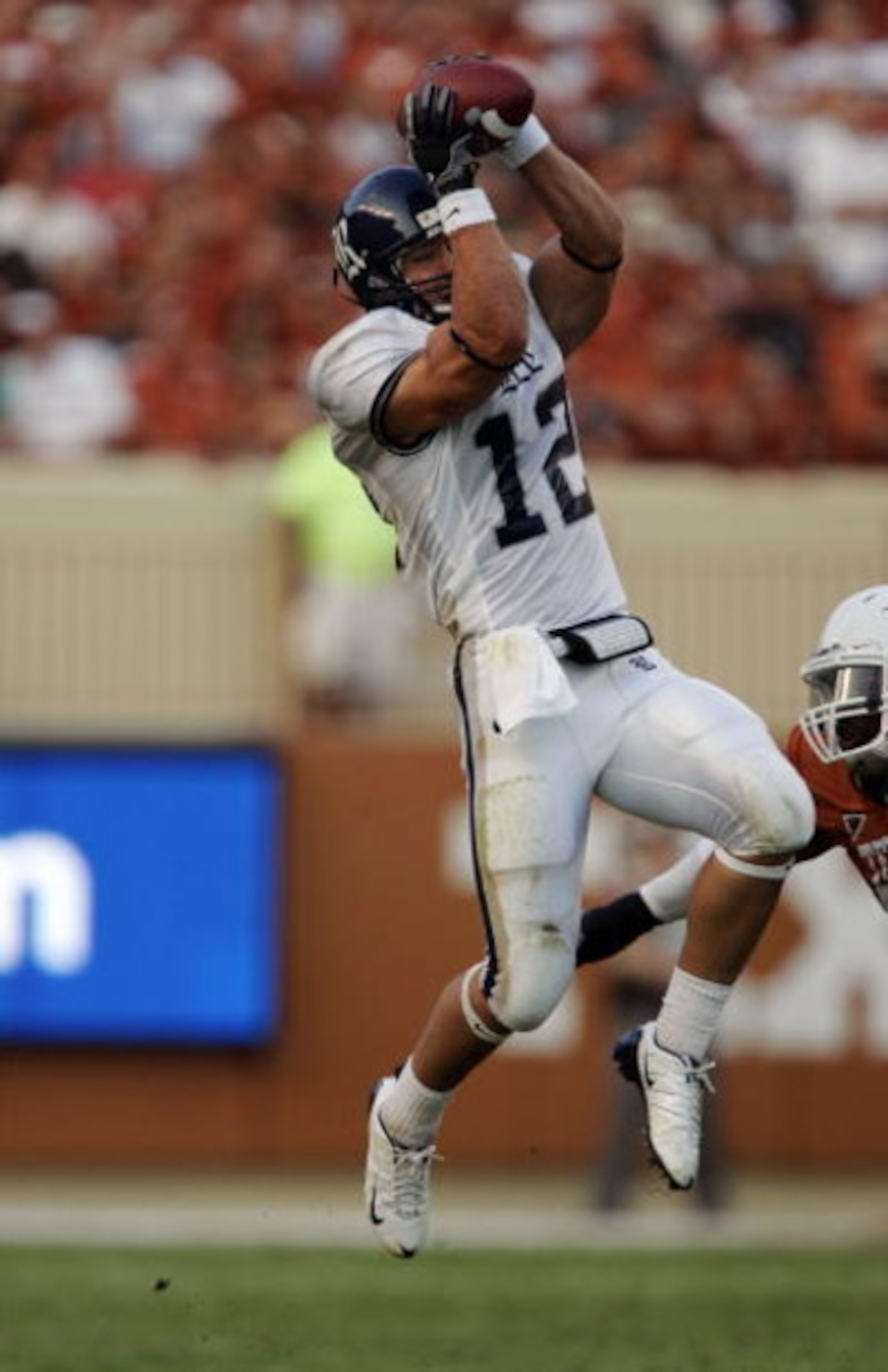 AUSTIN, TX - SEPTEMBER 20:  James Casey #12 of the Rice Owls catches a pass during the game against the Texas Longhorns on September 20, 2008 at Darrell K Royal-Texas Memorial Stadium in Austin, Texas. Texas won 52-10. (Photo by Brian Bahr/Getty Images)