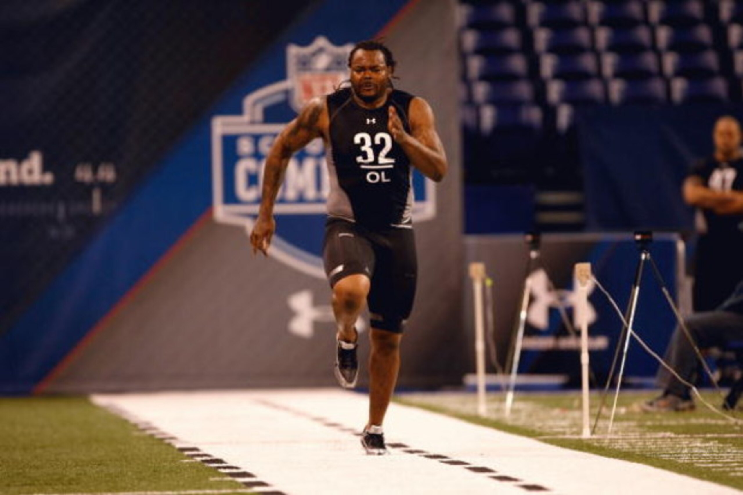 INDIANAPOLIS, IN - FEBRUARY 21:  Offensive lineman Phil Loadholt of Oklahoma runs the 40 yard dash during the NFL Scouting Combine presented by Under Armour at Lucas Oil Stadium on February 21, 2009 in Indianapolis, Indiana. (Photo by Scott Boehm/Getty Im
