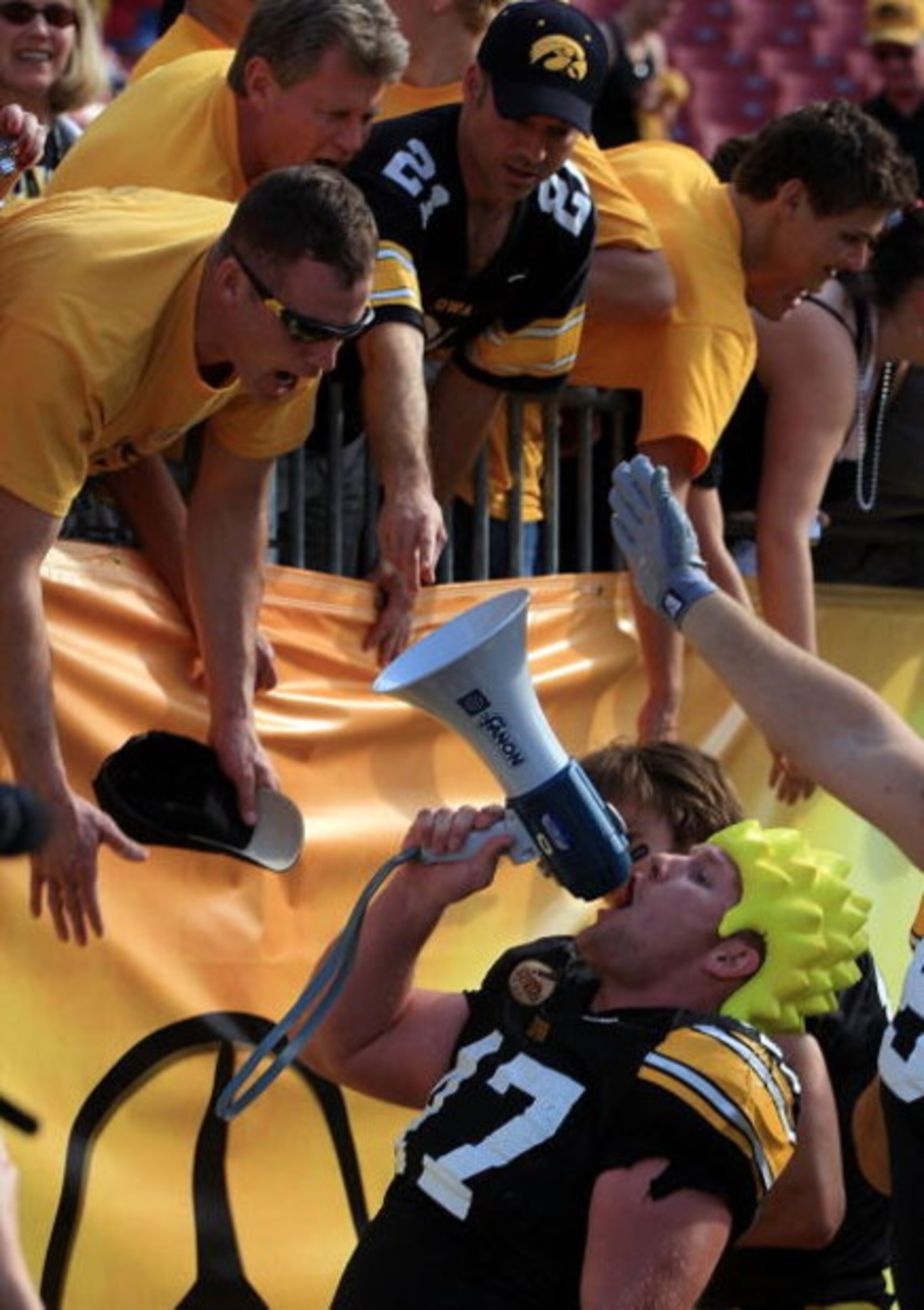 TAMPA, FL - JANUARY 01:  Mitch King #47 of the Iowa Hawkeyes celebrates with fans after a 31-10 victory over the South Carolina Gamecocks during the Outback Bowl on January 1, 2009 at Raymond James Stadium in Tampa, Florida.  (Photo by Scott Halleran/Gett