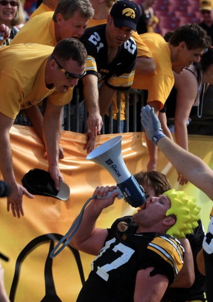 TAMPA, FL - JANUARY 01:  Mitch King #47 of the Iowa Hawkeyes celebrates with fans after a 31-10 victory over the South Carolina Gamecocks during the Outback Bowl on January 1, 2009 at Raymond James Stadium in Tampa, Florida.  (Photo by Scott Halleran/Gett