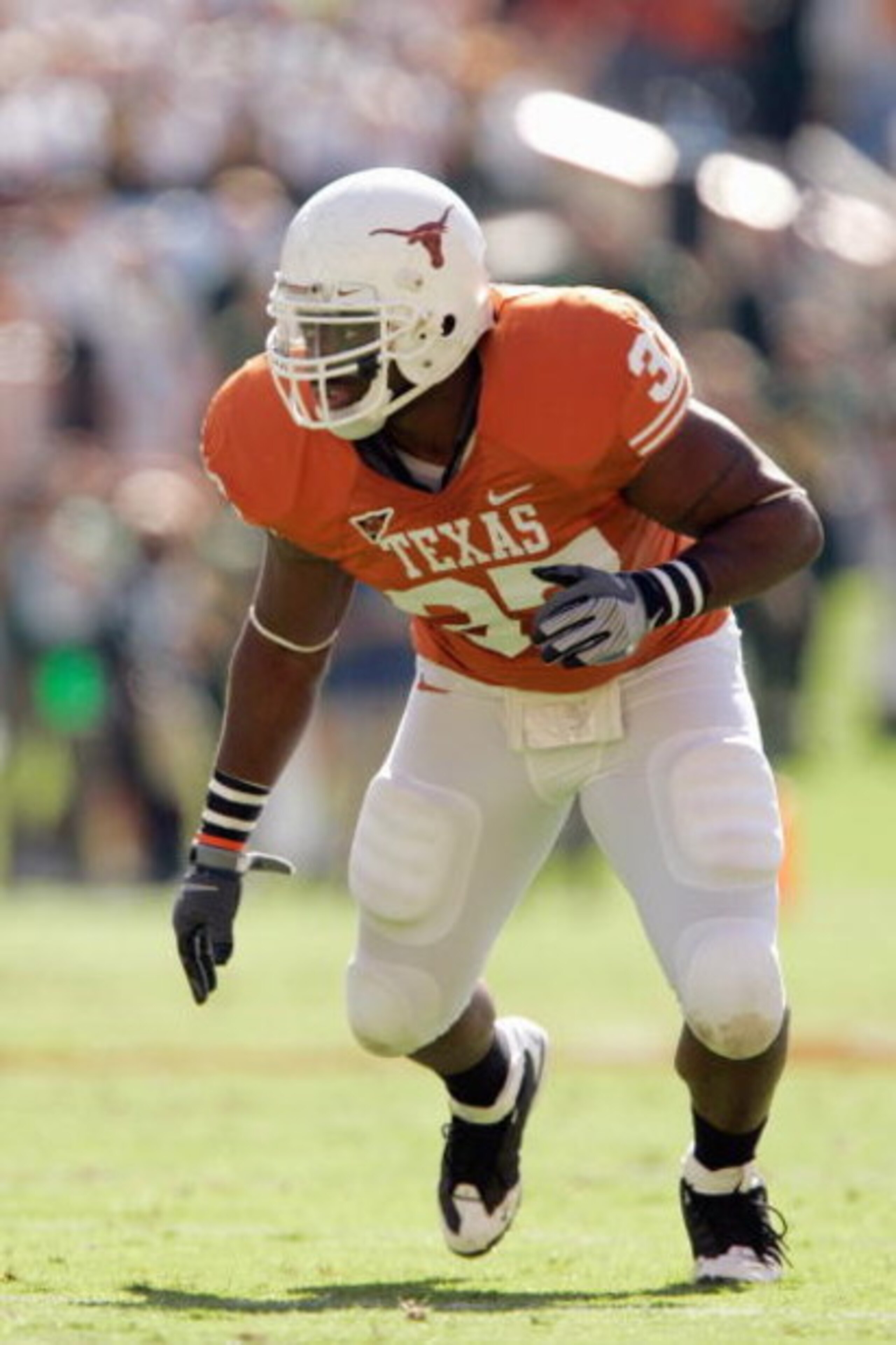 AUSTIN, TX - NOVEMBER 8:  Henry Melton #37 of the Texas Longhorns runs up the field during the game against the Baylor Bears on November 8, 2008 at Darrell K Royal-Texas Memorial Stadium in Austin, Texas.  Texas won 45-21. (Photo by Brian Bahr/Getty Image
