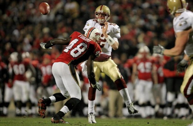 COLLEGE PARK, MD - NOVEMBER 10:  Quarterback Matt Ryan #12 of the Boston College Eagles delivers an incomplete pass as Moise Fokou #48 of the Maryland Terrapins provides pressure at Byrd Stadium on November 10, 2007 in College Park, Maryland.  (Photo by D
