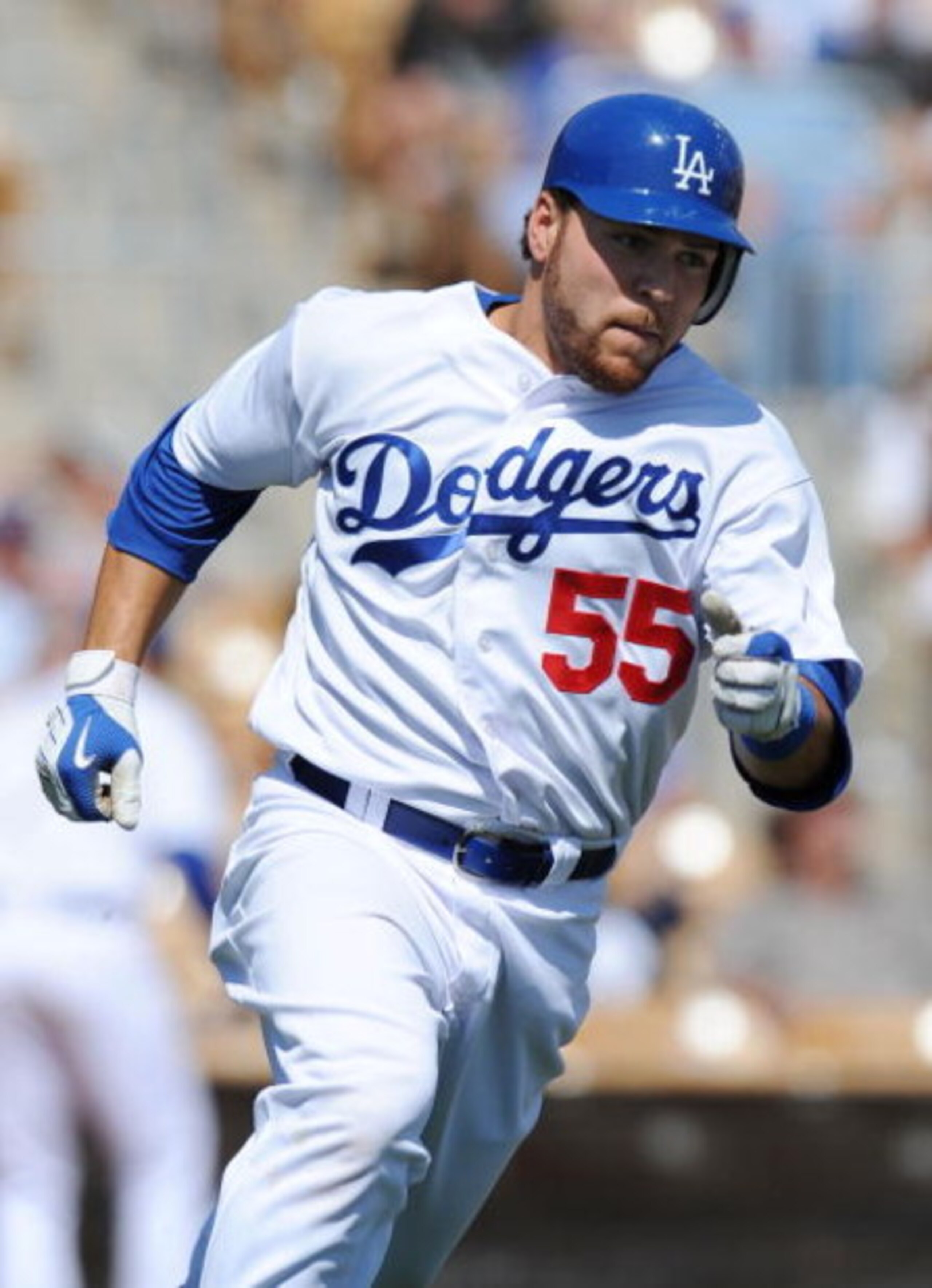 GLENDALE, AZ - MARCH 12:  Russell Martin #55 of the Los Angeles Dodgers runs to first base during a Spring Training game against Korea at Camelback Ranch on March 12, 2009 in Glendale, Arizona.  (Photo by Lisa Blumenfeld/Getty Images)