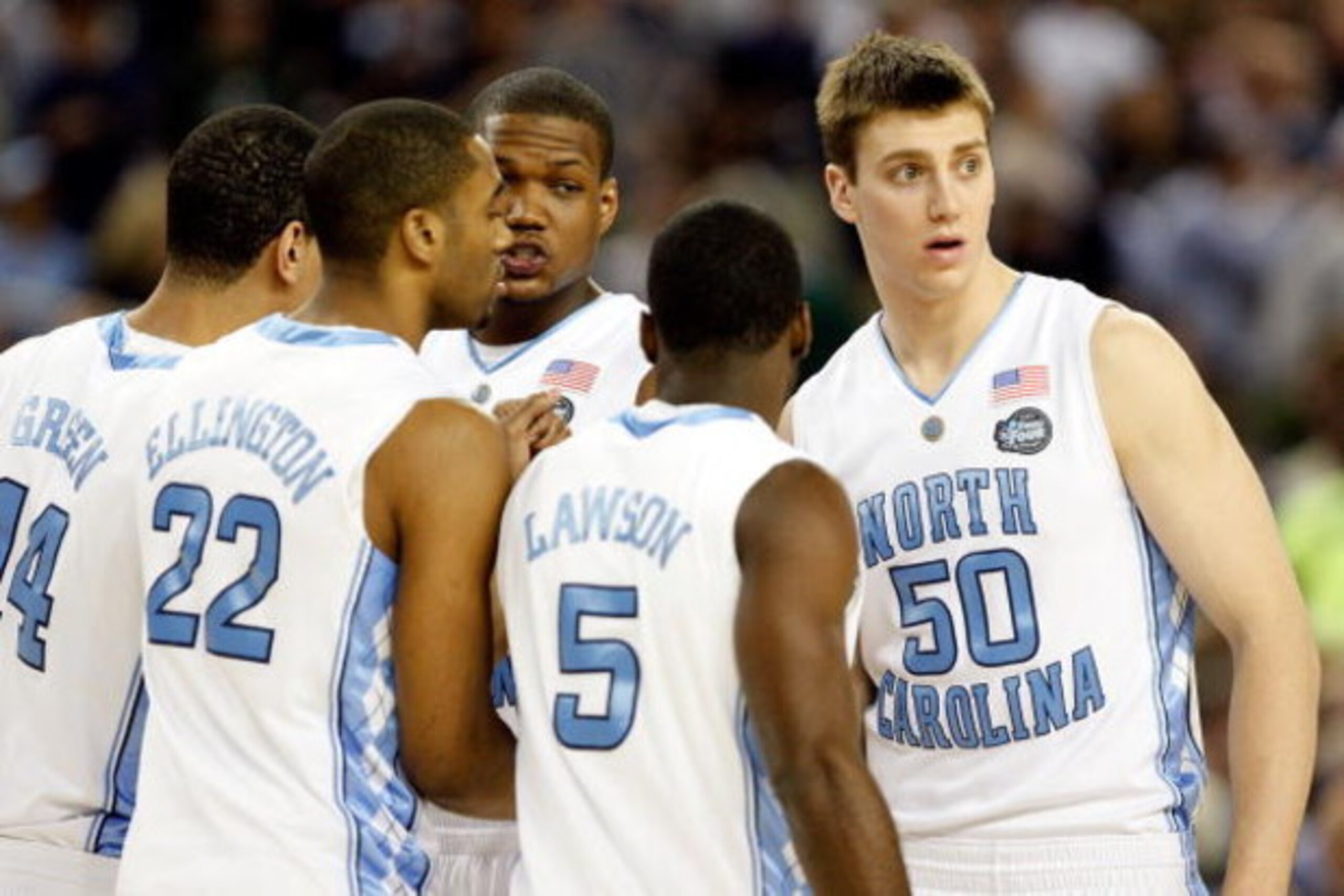 DETROIT - APRIL 04:  (R-L) Tyler Hansbrough #50, Ty Lawson #5, Deon Thompson #21, Wayne Ellington #22 and Danny Green #14 of the North Carolina Tar Heels huddle while taking on the Villanova Wildcats during the National Semifinal game of the NCAA Division