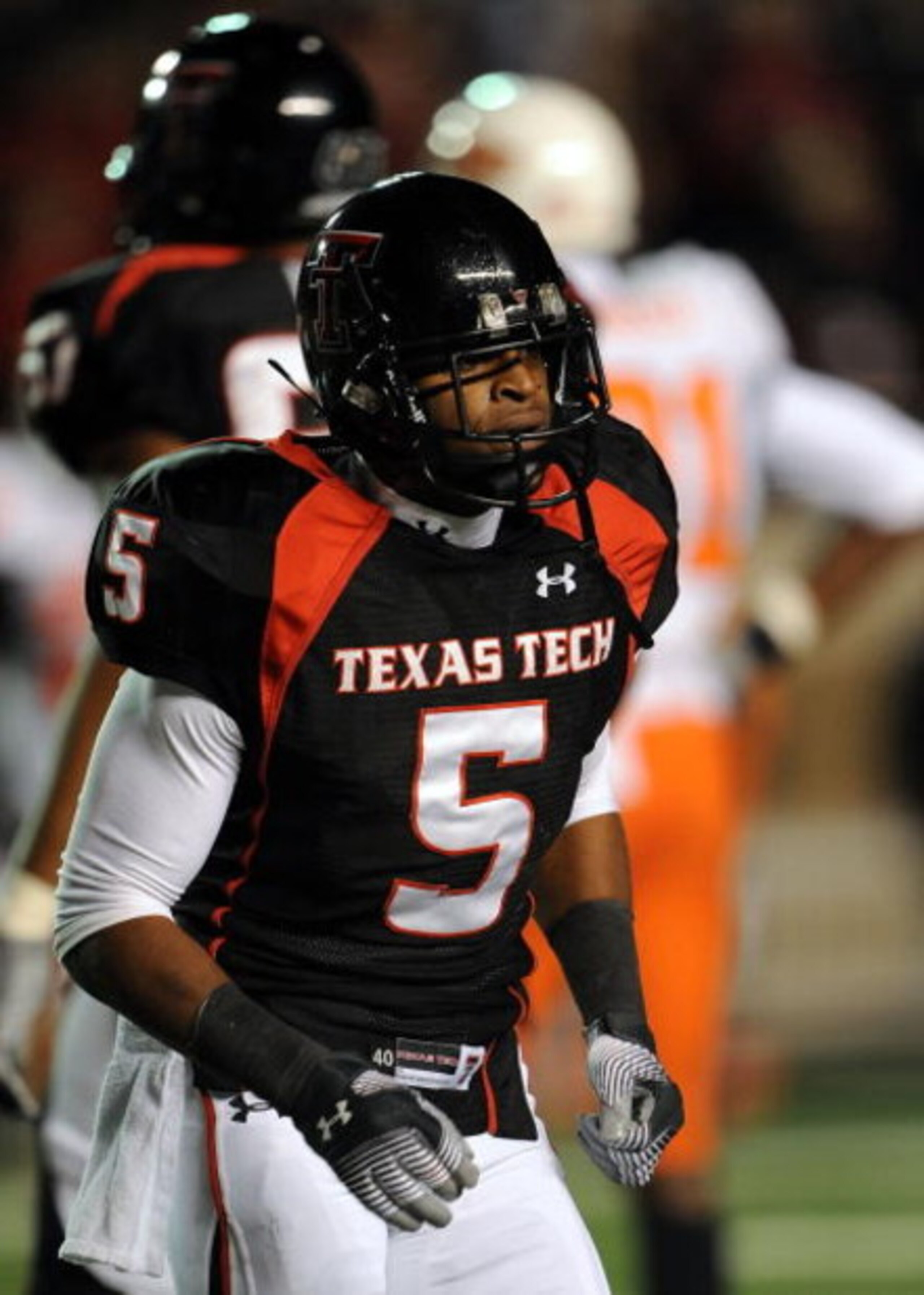 LUBBOCK, TX - NOVEMBER 08: Wide receiver Michael Crabtree #5 of the Texas Tech Red Raiders during play against the Oklahoma State Cowboys at Jones AT&T Stadium on November 8, 2008 in Lubbock, Texas. (Photo by Ronald Martinez/Getty Images) LUBBOCK, TX - NOVEMBER 08: Wide receiver Michael Crabtree #5 of the Texas Tech Red Raiders during play against the Oklahoma State Cowboys at Jones AT&T Stadium on November 8, 2008 in Lubbock, Texas. (Photo by Ronald Martinez/Getty Images)