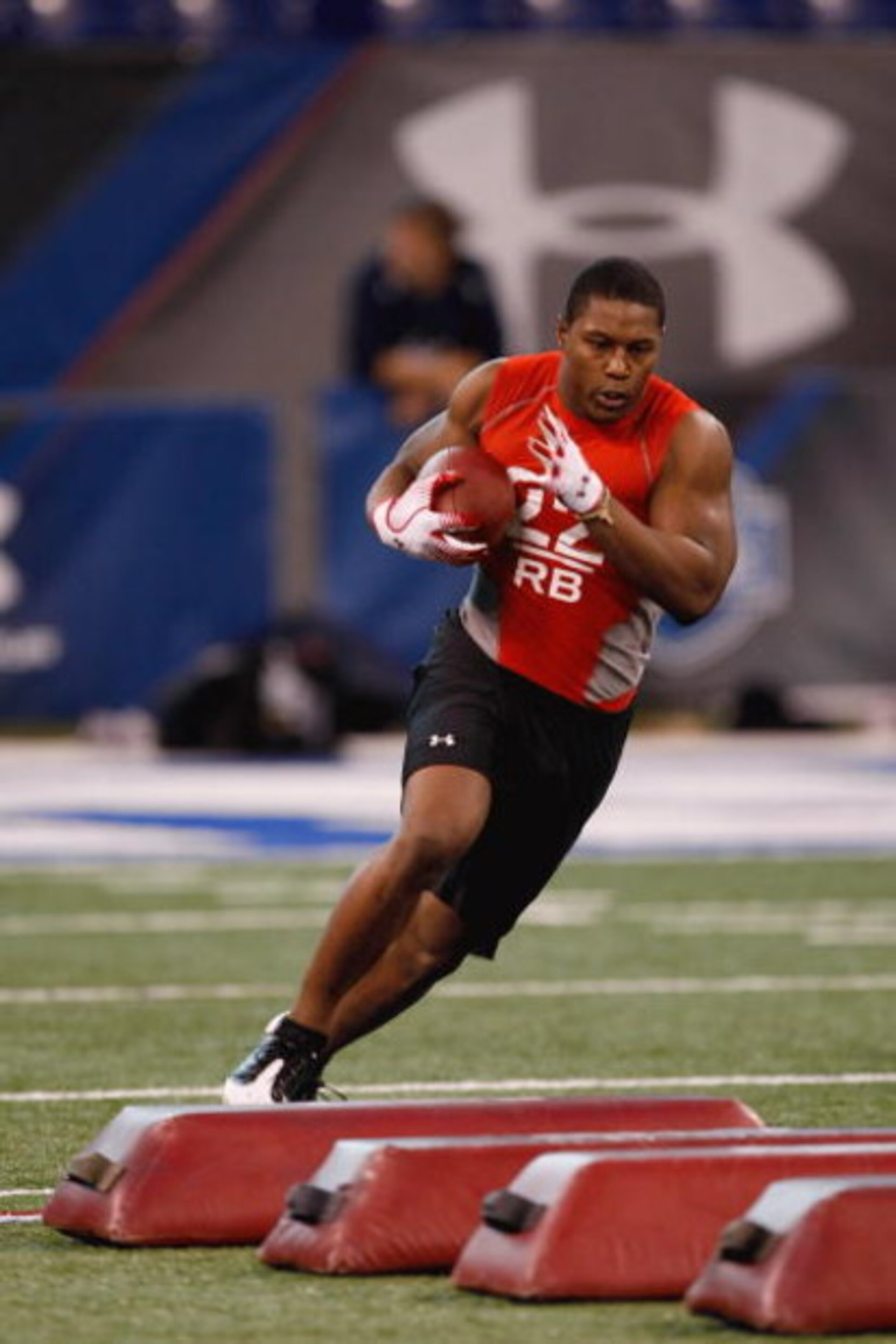 INDIANAPOLIS, IN - FEBRUARY 22: Running back Knowshon Moreno of Georgia runs with the football during the NFL Scouting Combine presented by Under Armour at Lucas Oil Stadium on February 22, 2009 in Indianapolis, Indiana. (Photo by Scott Boehm/Getty Image INDIANAPOLIS, IN - FEBRUARY 22: Running back Knowshon Moreno of Georgia runs with the football during the NFL Scouting Combine presented by Under Armour at Lucas Oil Stadium on February 22, 2009 in Indianapolis, Indiana. (Photo by Scott Boehm/Getty Image