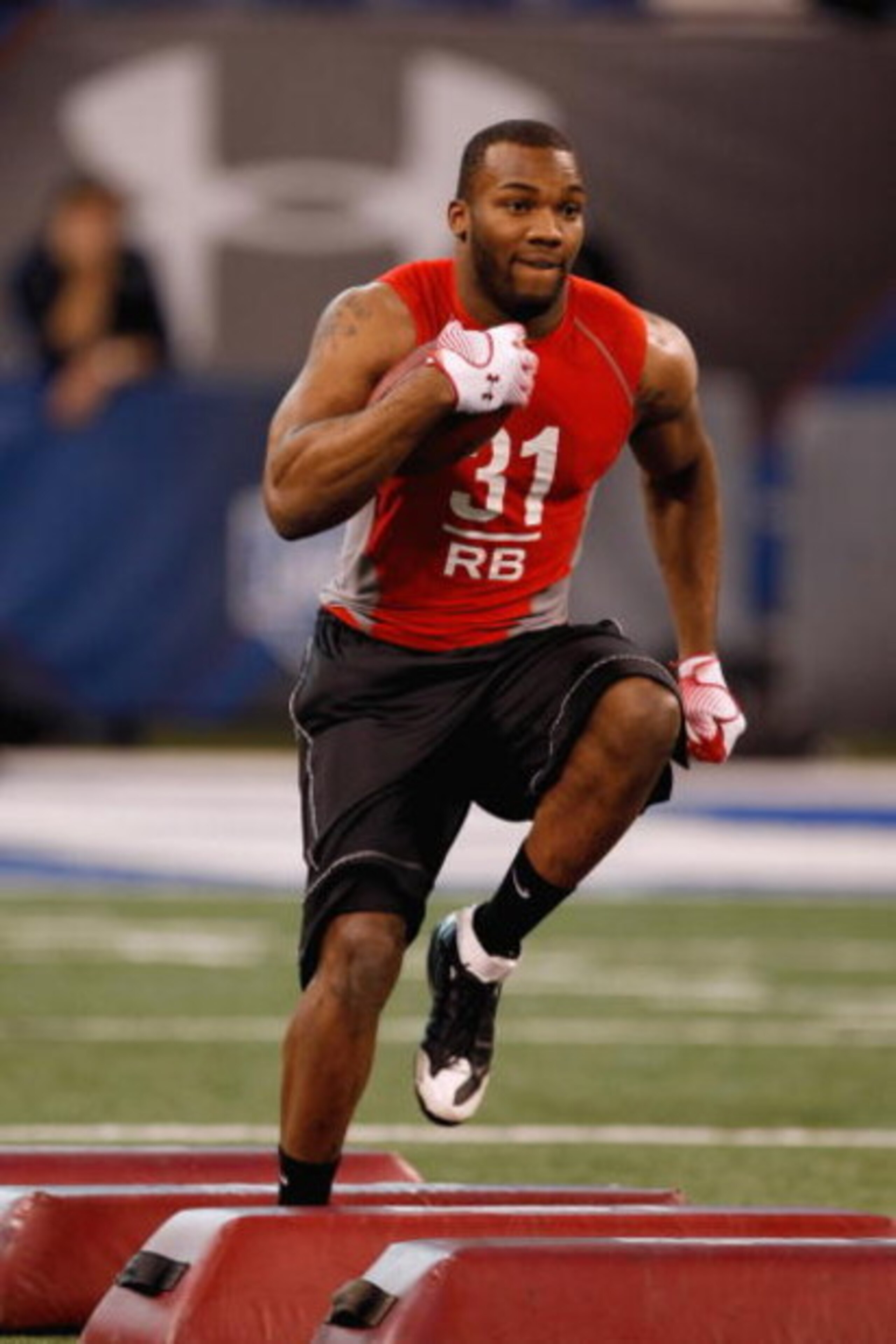 INDIANAPOLIS, IN - FEBRUARY 22: Running back Beanie Wells of Ohio State runs with the football during the NFL Scouting Combine presented by Under Armour at Lucas Oil Stadium on February 22, 2009 in Indianapolis, Indiana. (Photo by Scott Boehm/Getty Image INDIANAPOLIS, IN - FEBRUARY 22: Running back Beanie Wells of Ohio State runs with the football during the NFL Scouting Combine presented by Under Armour at Lucas Oil Stadium on February 22, 2009 in Indianapolis, Indiana. (Photo by Scott Boehm/Getty Image