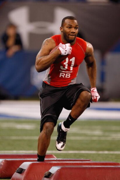 INDIANAPOLIS, IN - FEBRUARY 22:  Running back Beanie Wells of Ohio State runs with the football during the NFL Scouting Combine presented by Under Armour at Lucas Oil Stadium on February 22, 2009 in Indianapolis, Indiana. (Photo by Scott Boehm/Getty Image