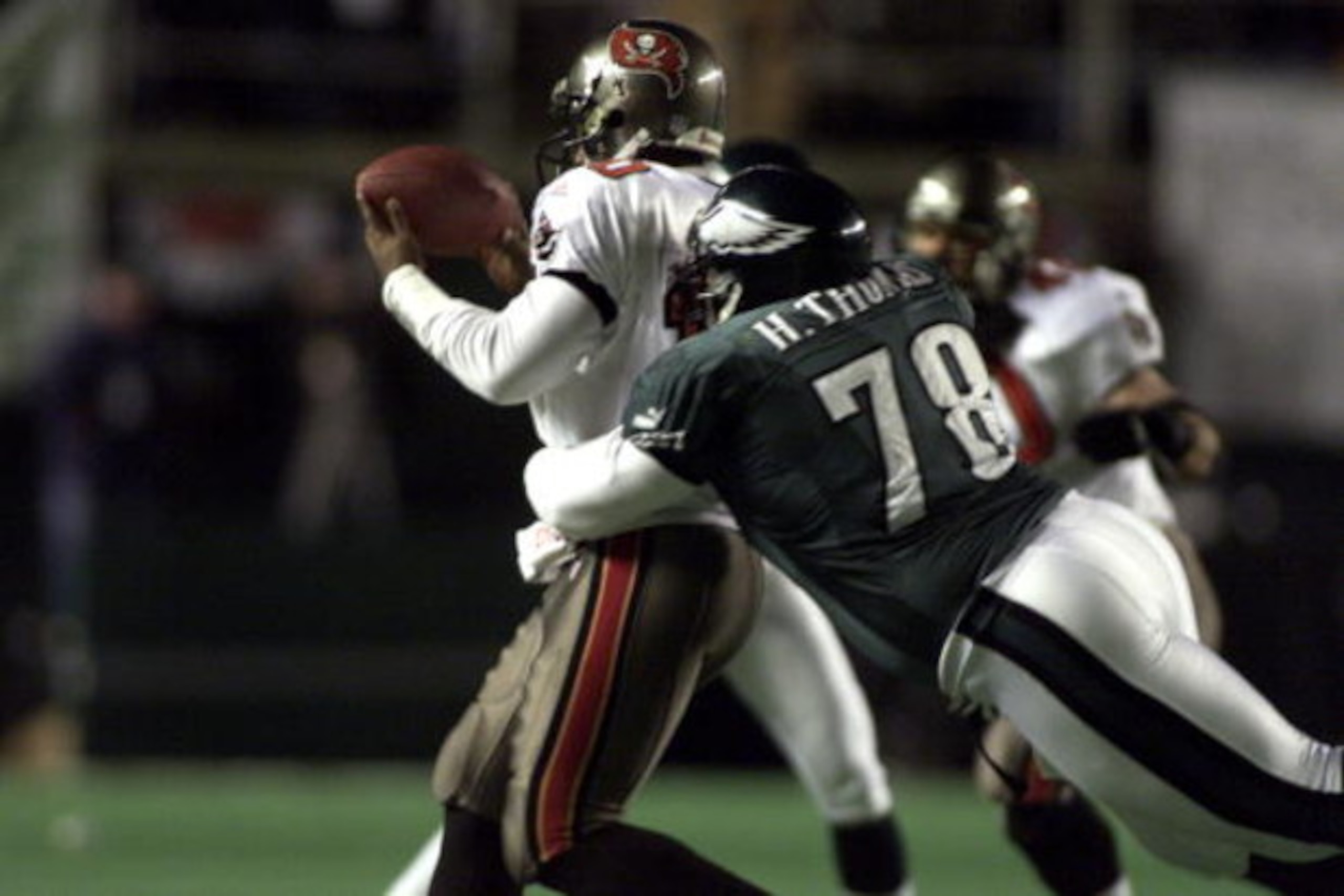31 Dec 2000: Hollis Thomas #78 of the Eagles sacks Bucs quarterback Shaun King #10 during the NFC Wild Card game between the Tampa Bay Buccaneers and the Philadelphia Eagles at Veterans Stadium in Philadelphia, Pennsylvania. The Eagles defeated the Bucs 31 Dec 2000: Hollis Thomas #78 of the Eagles sacks Bucs quarterback Shaun King #10 during the NFC Wild Card game between the Tampa Bay Buccaneers and the Philadelphia Eagles at Veterans Stadium in Philadelphia, Pennsylvania. The Eagles defeated the Bucs