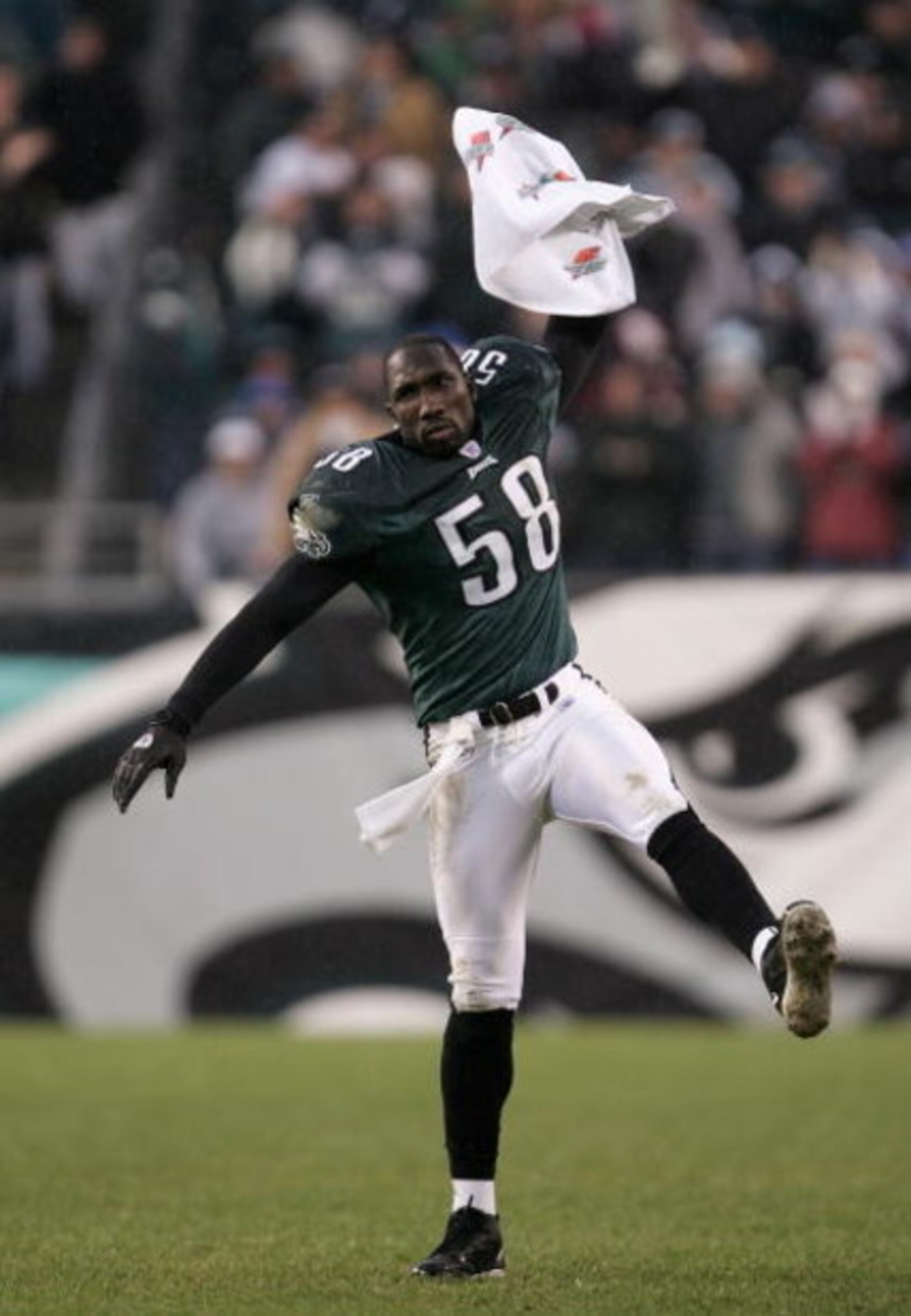 PHILADELPHIA - DECEMBER 19: Ike Reese #58 of the Philadelphia Eagles celebrates as his offensive teammates drive toward the game winning touchdown against the Dallas Cowboys as the Eagles defeated the Cowboys 12-7 during NFL action at Lincoln Financial F PHILADELPHIA - DECEMBER 19: Ike Reese #58 of the Philadelphia Eagles celebrates as his offensive teammates drive toward the game winning touchdown against the Dallas Cowboys as the Eagles defeated the Cowboys 12-7 during NFL action at Lincoln Financial F