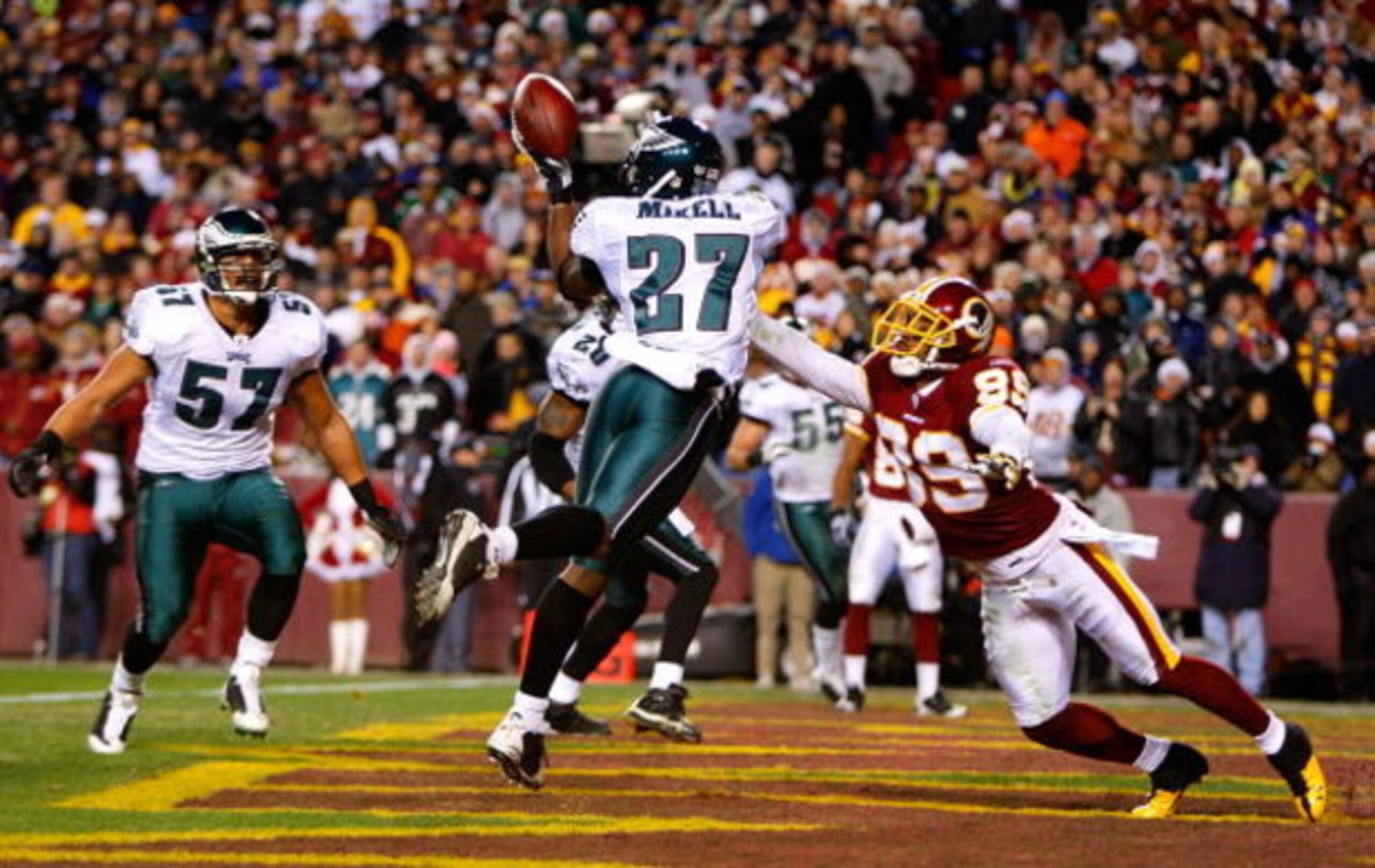 LANDOVER, MD - DECEMBER 21: Quintin Mikell #27 of the Philadelphia Eagles breaks up a touchdown reception intended for Santana Moss #89 of the Washington Redskins during the game on December 21, 2008 at FedEx Field in Landover, Maryland. (Photo by Kevin LANDOVER, MD - DECEMBER 21: Quintin Mikell #27 of the Philadelphia Eagles breaks up a touchdown reception intended for Santana Moss #89 of the Washington Redskins during the game on December 21, 2008 at FedEx Field in Landover, Maryland. (Photo by Kevin