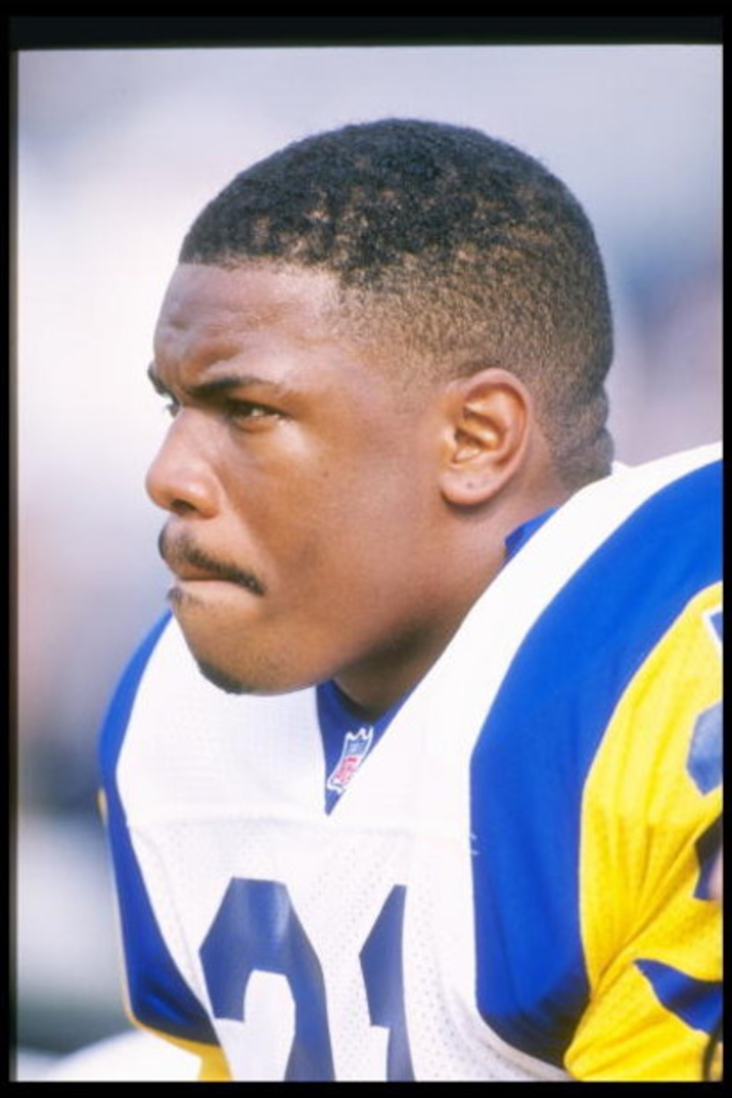 27 Oct 1996:  Running back Lawrence Phillips of the St. Louis Rams during the Rams 37-31 loss to the Baltimore Ravens at Memorial Stadium in Baltimore, Maryland. Mandatory Credit: Otto Greule  /Allsport