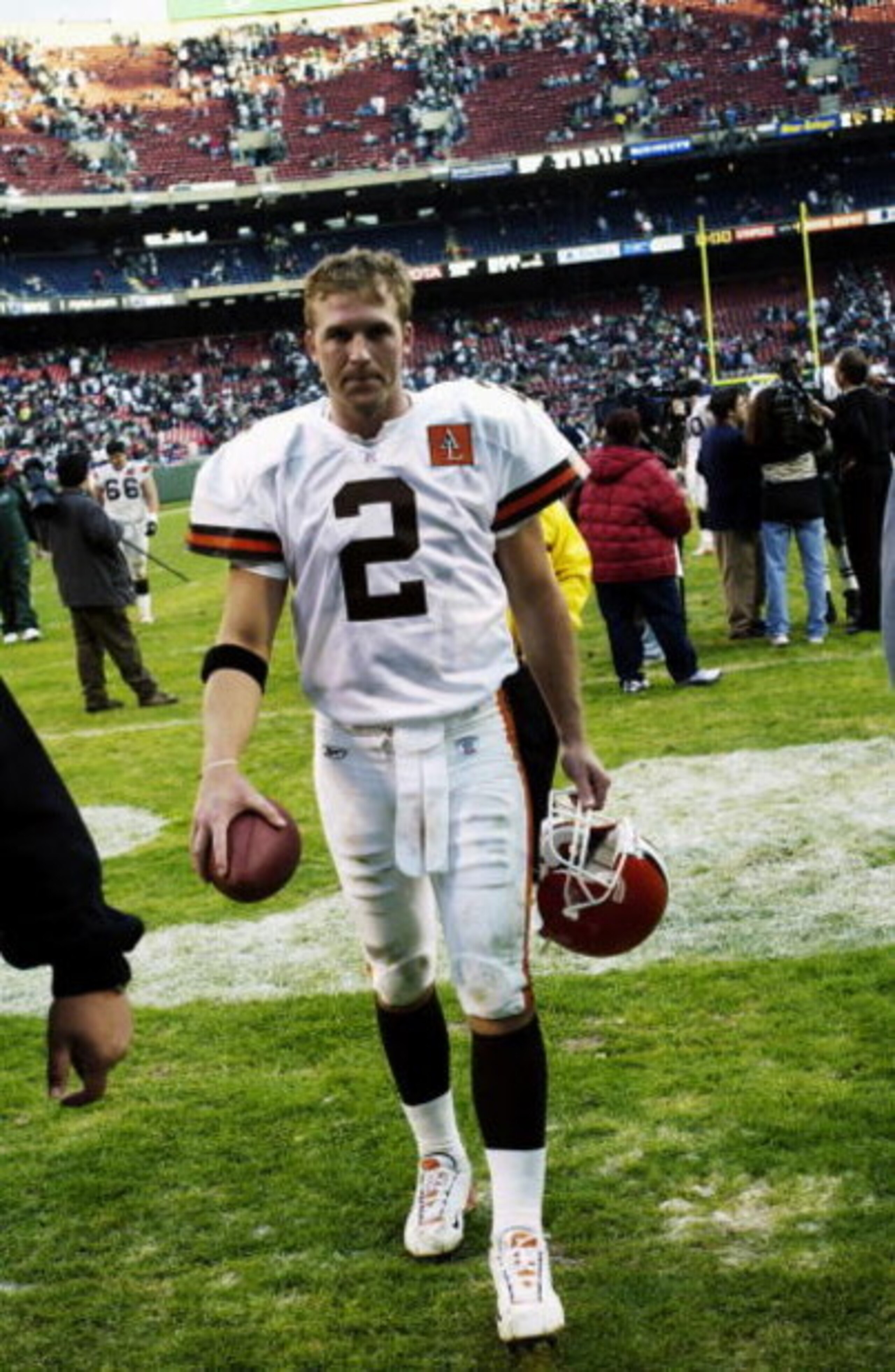 EAST RUTHERFORD, NJ - OCTOBER 27:  Quarterback Tim Couch #2 of the Cleveland Browns walks off the field after  the NFL game against the New York Jets at Giant Stadium on October 27, 2002 in East Rutherford, New Jersey. The Browns defeated the Jets 24-21. 