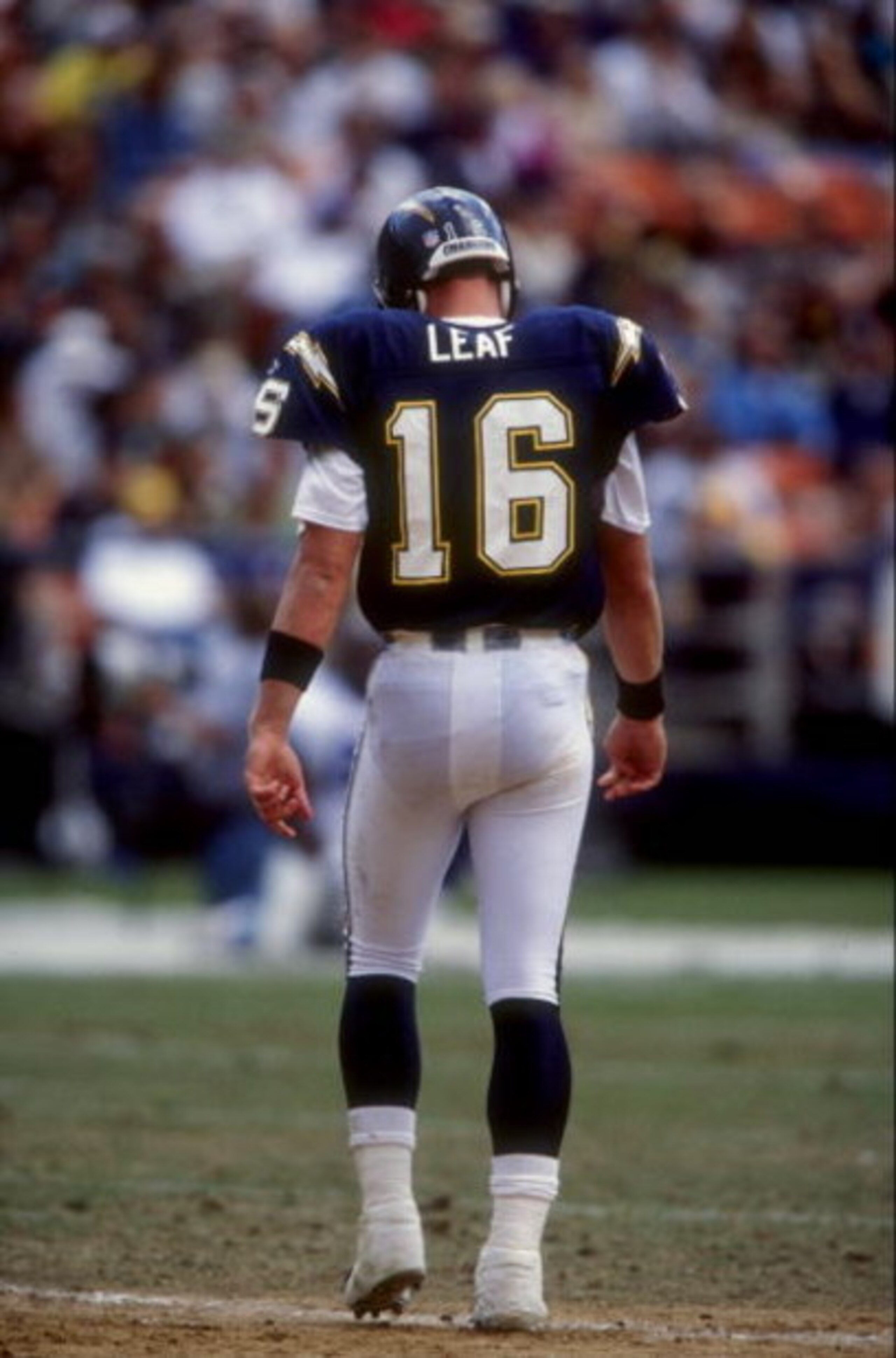 25 Oct 1998: Quarterback  Ryan Leaf  #16 of the San Diego Chargers walks on the field during a game against the Seattle Seahawks at Qualcomm Stadium in San Diego, California. The Seahawks defeated the Chargers 27-20. Mandatory Credit: Todd Warshaw  /Allsp
