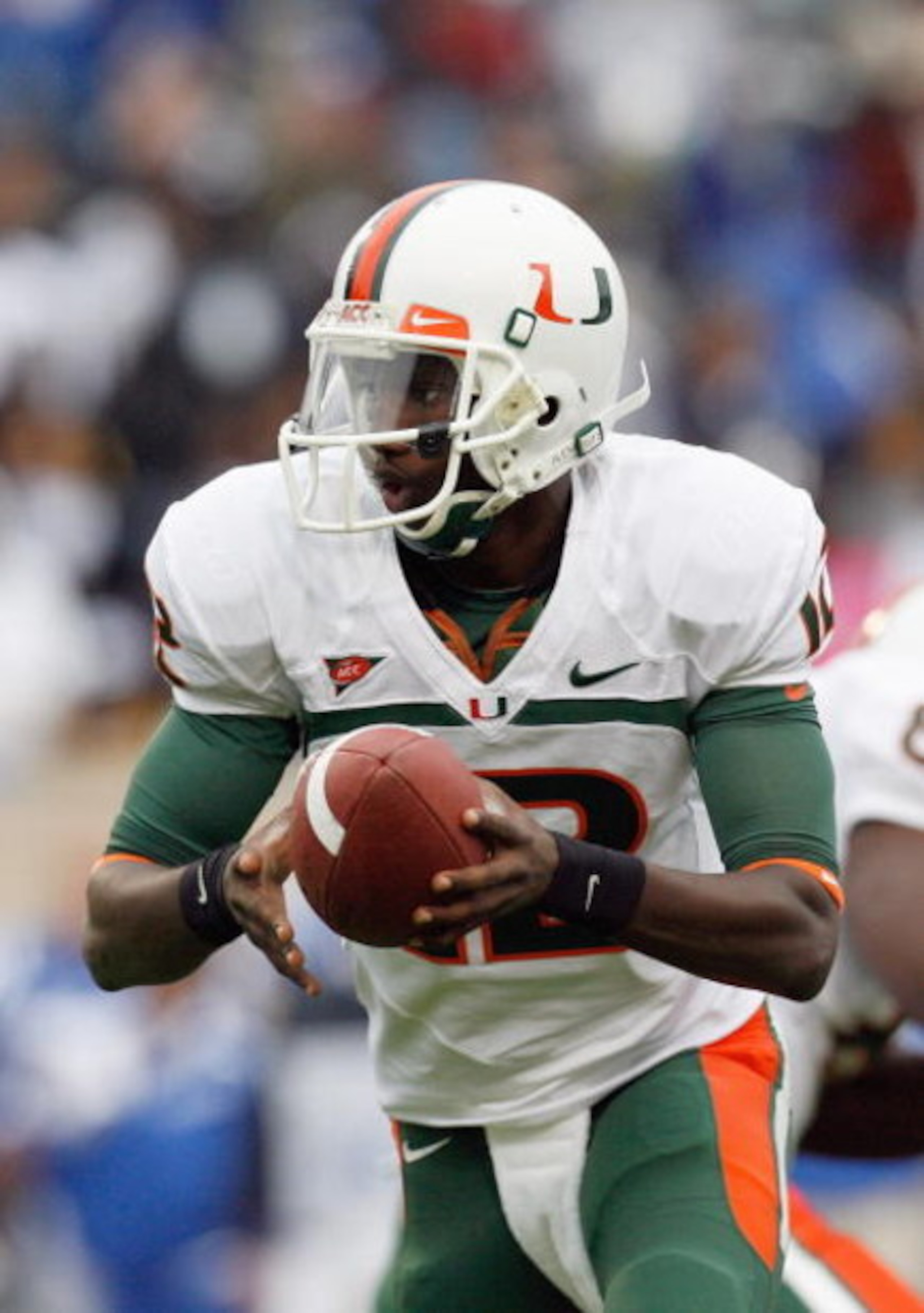 DURHAM, NC - OCTOBER 18:  Quarterback Jacory Harris #12 of the Miami Hurricanes looks to hand off the ball during the game against the Duke Blue Devils at Wallace Wade Stadium on October 18, 2008 in Durham, North Carolina.  (Photo by Kevin C. Cox/Getty Im