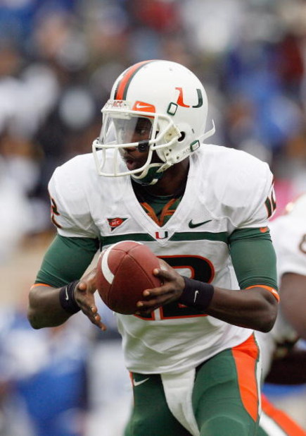 DURHAM, NC - OCTOBER 18:  Quarterback Jacory Harris #12 of the Miami Hurricanes looks to hand off the ball during the game against the Duke Blue Devils at Wallace Wade Stadium on October 18, 2008 in Durham, North Carolina.  (Photo by Kevin C. Cox/Getty Im