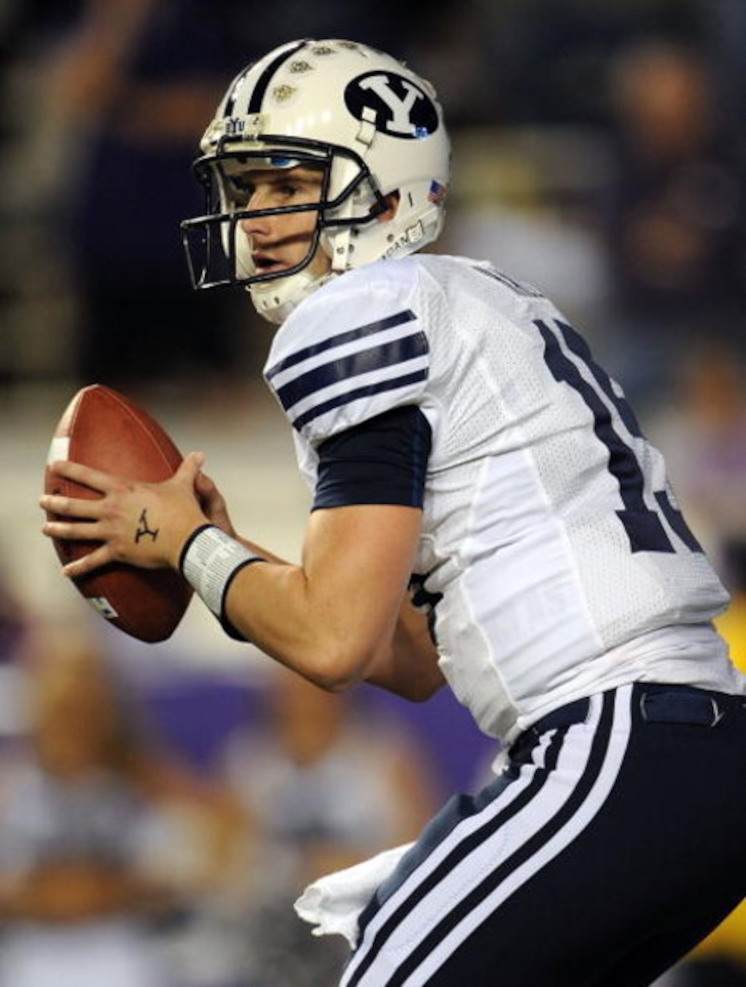 FORT WORTH, TX - OCTOBER 16:  Quarterback Max Hall #15 of the BYU Cougars drops back to pass against the TCU Horned Frogs in the first quarter at Amon G. Carter Stadium on October 16, 2008 in Fort Worth, Texas.  (Photo by Ronald Martinez/Getty Images)