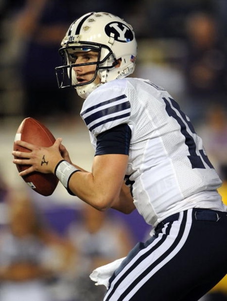 FORT WORTH, TX - OCTOBER 16:  Quarterback Max Hall #15 of the BYU Cougars drops back to pass against the TCU Horned Frogs in the first quarter at Amon G. Carter Stadium on October 16, 2008 in Fort Worth, Texas.  (Photo by Ronald Martinez/Getty Images)