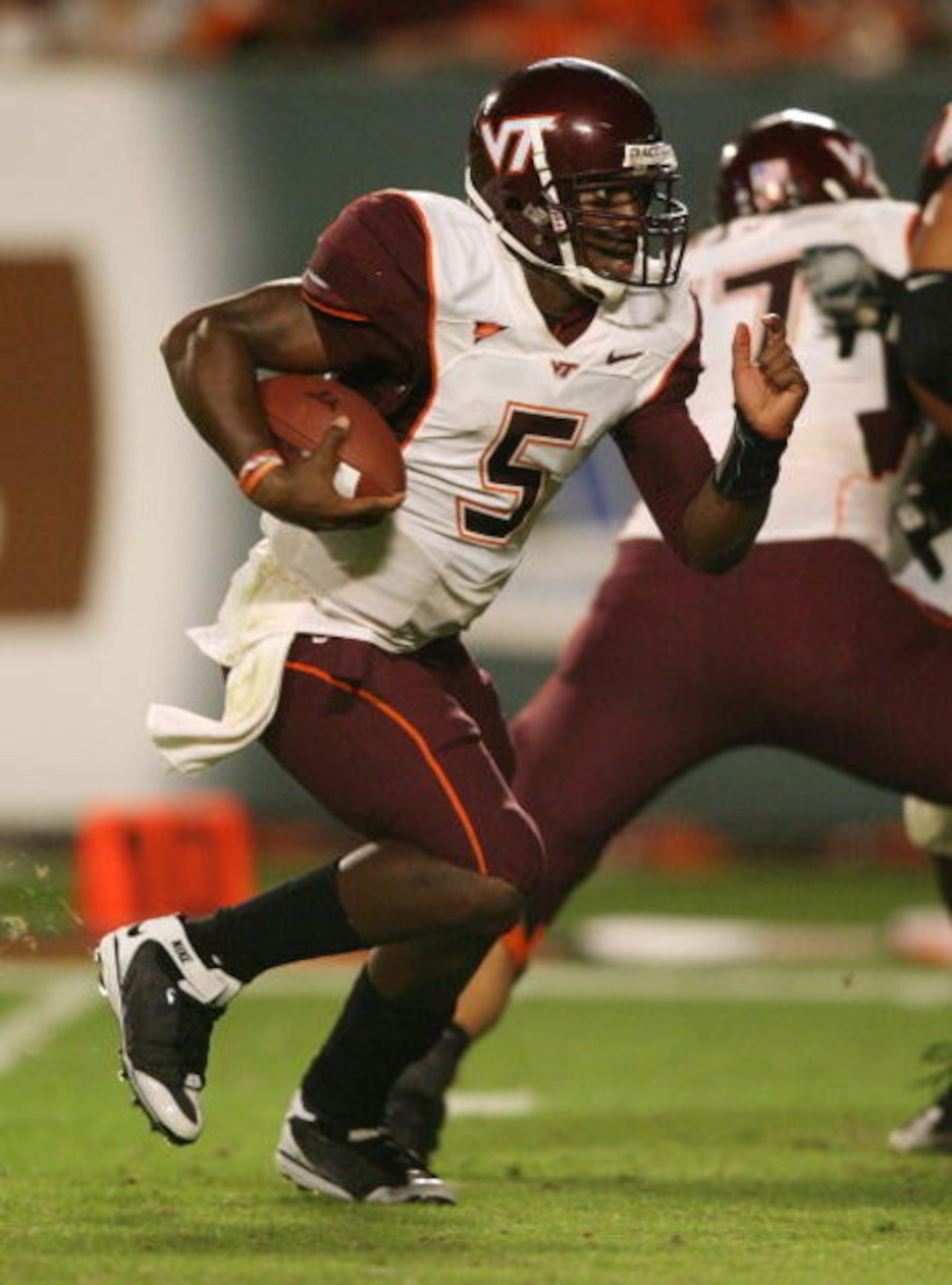 MIAMI - NOVEMBER 13:  Quarterback Tyrod Taylor #5 of the Virginia Tech Hokies runs enroute to a touchdown in the fourth quarter against the Miami Hurricanes at Dolphin Stadium on November 13, 2008 in Miami, Florida. Miami defeated the Hokies 16-14.  (Phot