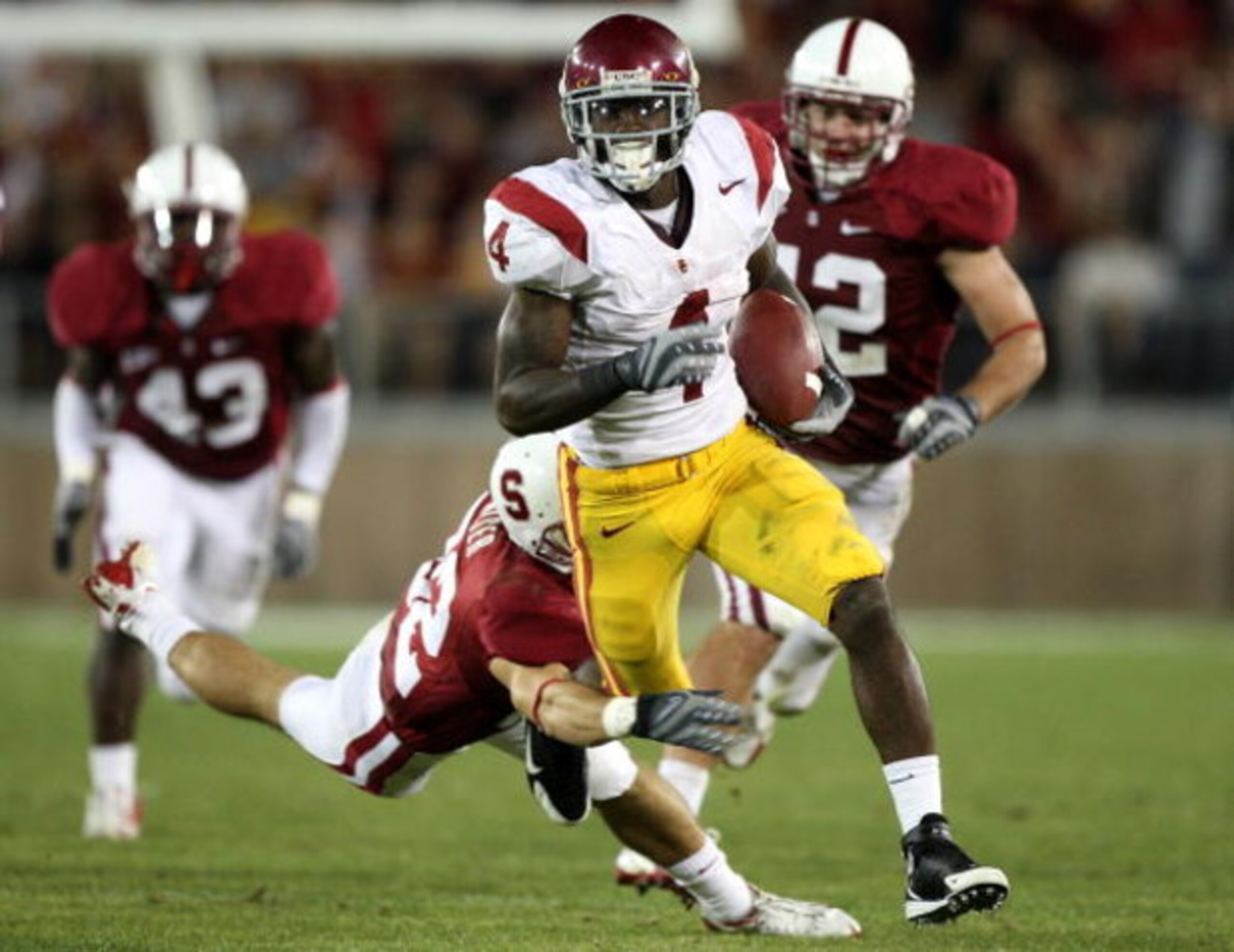 STANFORD, CA - NOVEMBER 15:  Joe McKnight #4 of USC Trojans runs against the Stanford Cardinals in the second half at Stanford Stadium on November 15, 2008 in Stanford, California.  (Photo by Jed Jacobsohn/Getty Images)