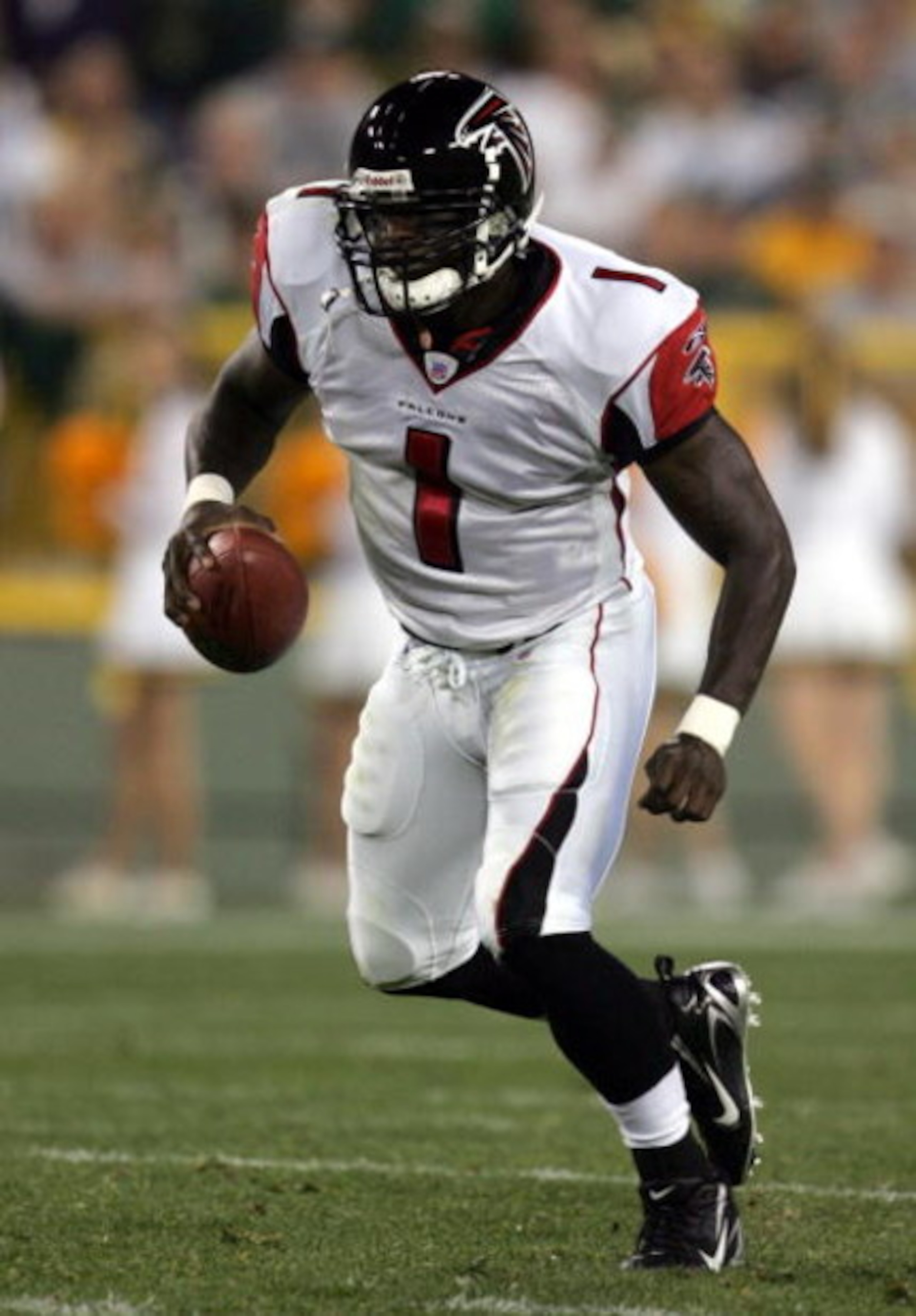 GREEN BAY, WI - AUGUST 19:  Quaterback D.J. Shockley #1 of the Atlanta Falcons scrambles with the ball during the preseason game against the Green Bay Packers on August 19, 2006 at Lambeau Field in Green Bay, Wisconsin. The Packers won 38-10. (Photo by Jo