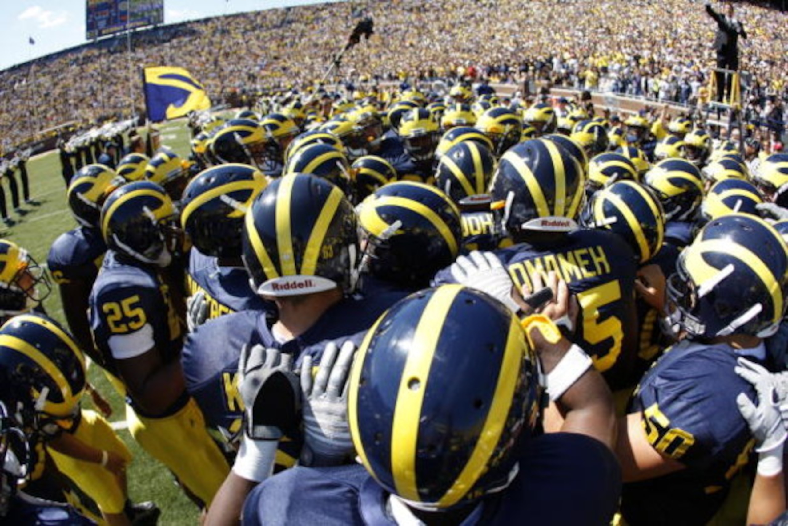 ANN ARBOR, MI - SEPTEMBER 6:  The Michigan Wolverines huddle together in a huddle prior to the game against the Miami of Ohio Red Hawks on September 6, 2008 at Michigan Stadium in Ann Arbor, Michigan.  The Wolverines defeated the Red Hawks 16-6. (Photo by
