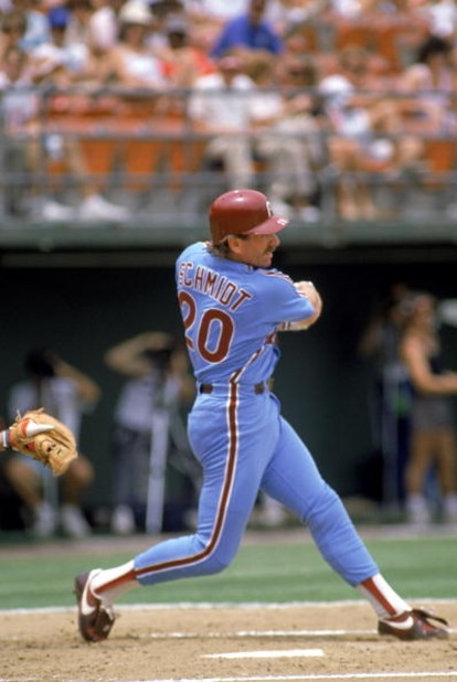 SAN DIEGO - 1986:  Third baseman Mike Schmidt #20 of the Philadelphia Phillies swings at the pitch during the 1986 season MLB game against the San Diego Padres at Jack Murphy Stadium in San Diego, California.  (Photo by Stephen Dunn/Getty Images) 