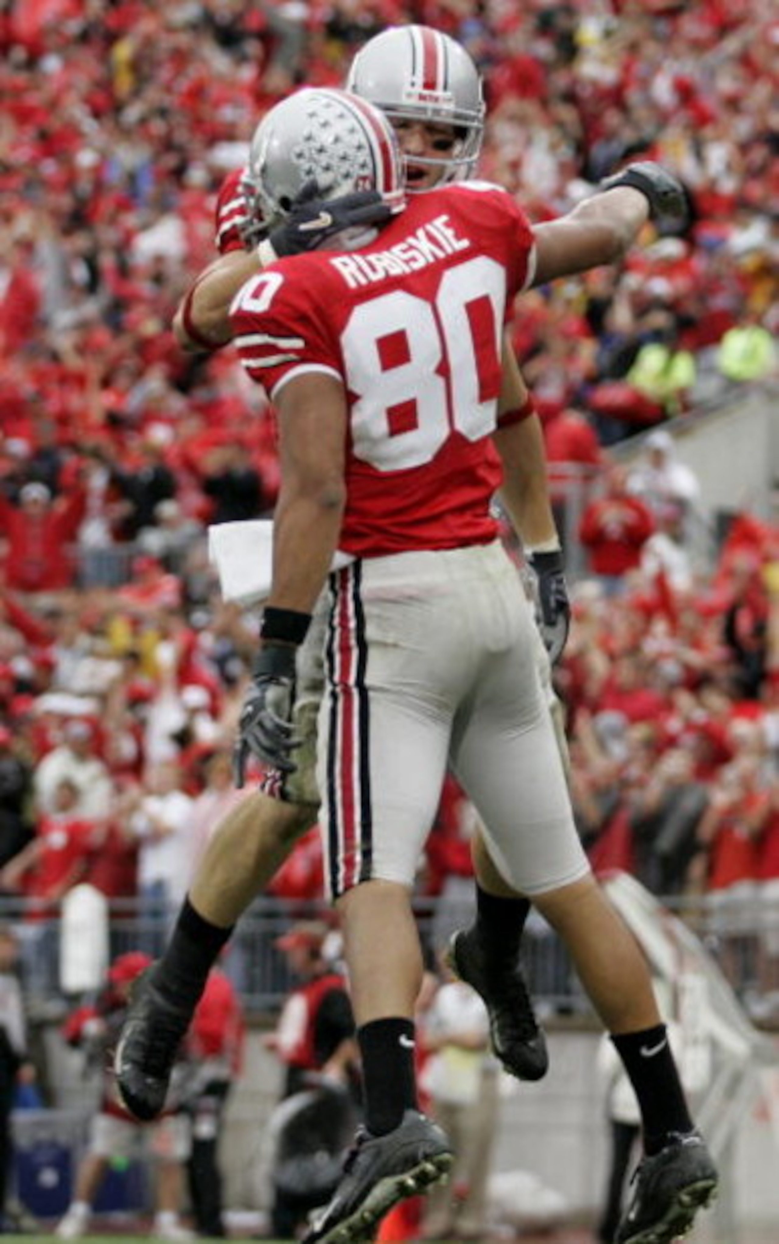 COLUMBUS, OH - SEPTEMBER 23:  Brian Robiskie #80 of the Ohio State Buckeyes is congradulated by Anthony Gonzalez #11 after a catch against the Penn State Nittany Lions on September 23, 2006 at Ohio Stadium in Columbus, Ohio. Ohio State won the game 28-6. 