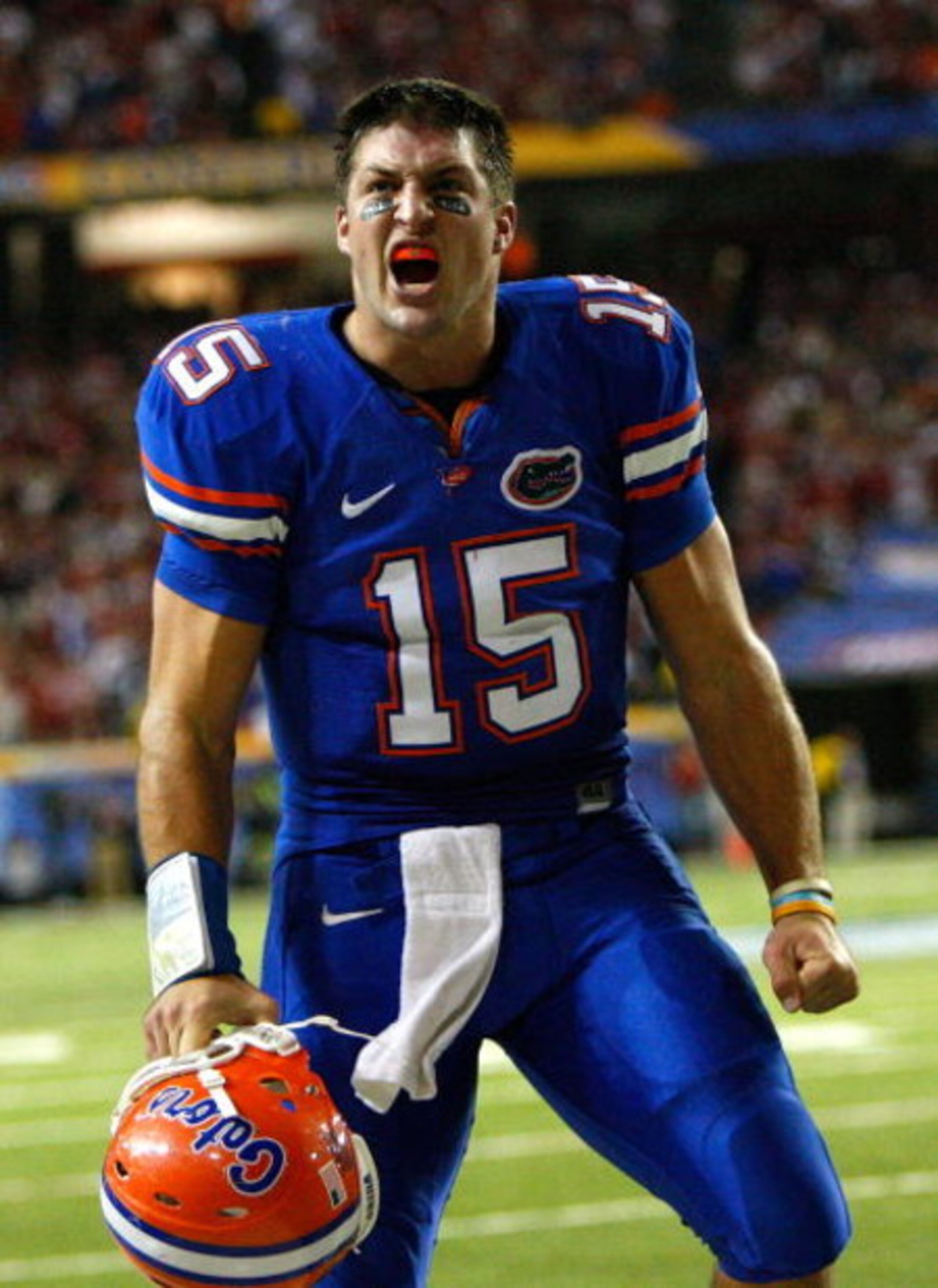ATLANTA - DECEMBER 06:  Quarterback Tim Tebow #15 of the Florida Gators reacts after tossing a touchdown pass against the Alabama Crimson Tide during the SEC Championship on December 6, 2008 at the Georgia Dome in Atlanta, Georgia.  (Photo by Kevin C. Cox