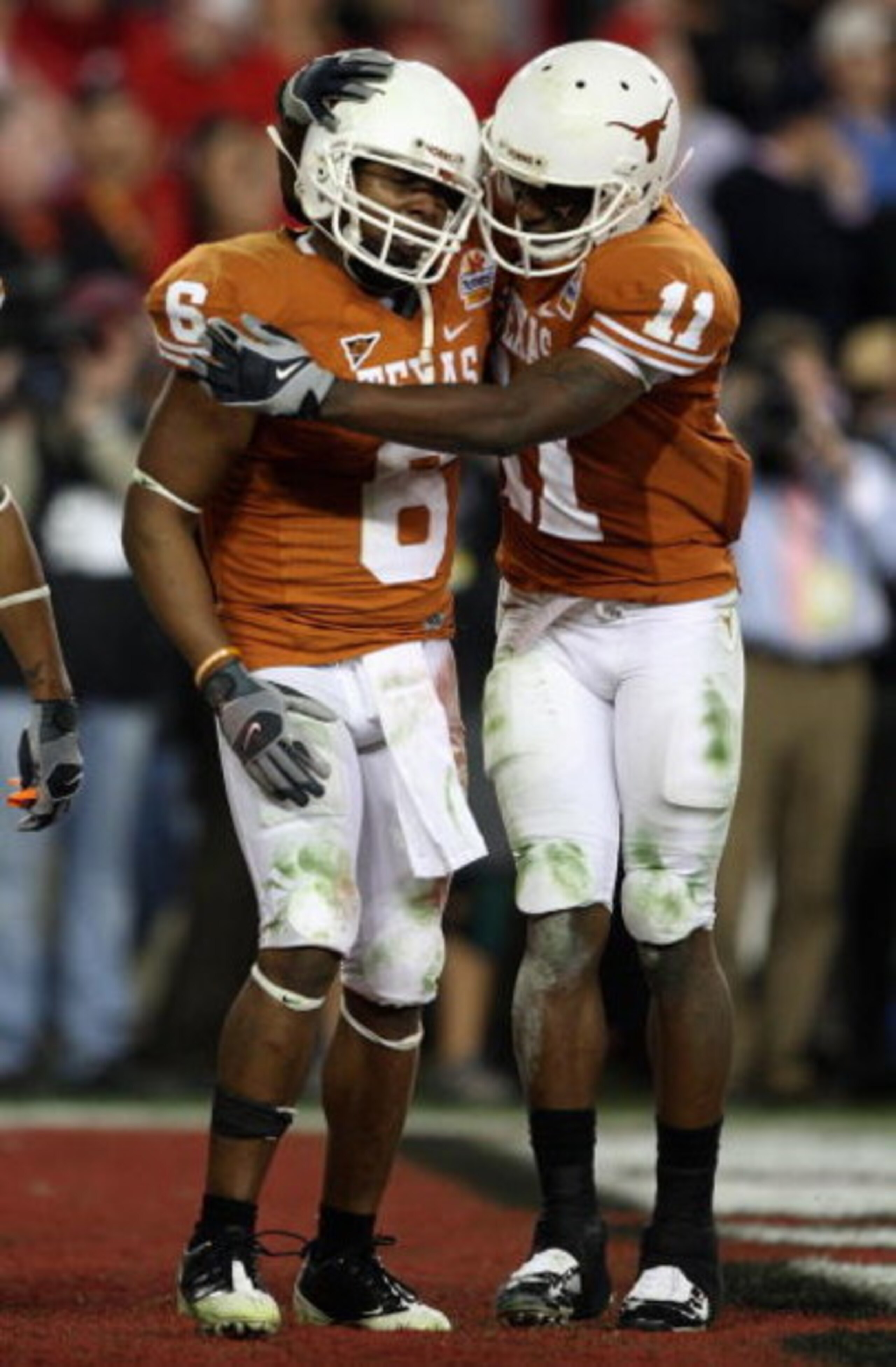 GLENDALE, AZ - JANUARY 05:  Wide receiver Quan Cosby #6 of the Texas Longhorns celebrates with  Jared Norton #11 after a 26 yard touchdown reception against the Ohio State Buckeyes during the Tostitos Fiesta Bowl Game on January 5, 2009 at University of P