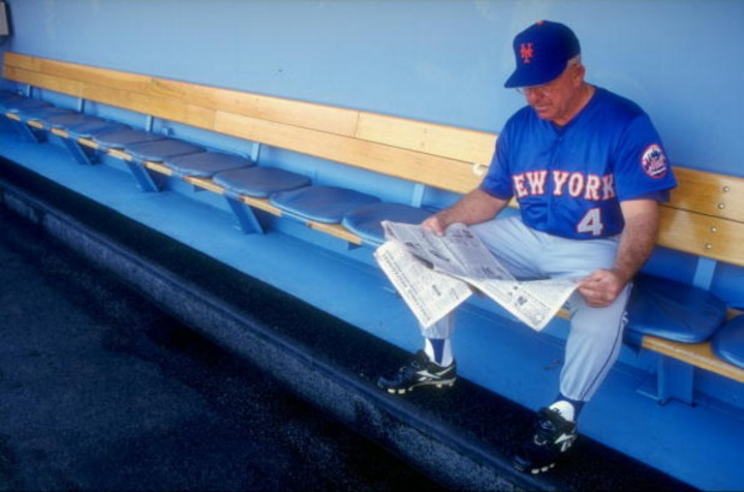 29 Aug 1998: Coach Cookie Rojas #4 of the New York Mets reads a newspaper on the bench prior to a game against the Los Angeles Dodgers at Dodger Stadium in Los Angeles, California. The Mets defeated the Dodgers 4-3. Mandatory Credit: Donald Miralle /All 29 Aug 1998: Coach Cookie Rojas #4 of the New York Mets reads a newspaper on the bench prior to a game against the Los Angeles Dodgers at Dodger Stadium in Los Angeles, California. The Mets defeated the Dodgers 4-3. Mandatory Credit: Donald Miralle /All