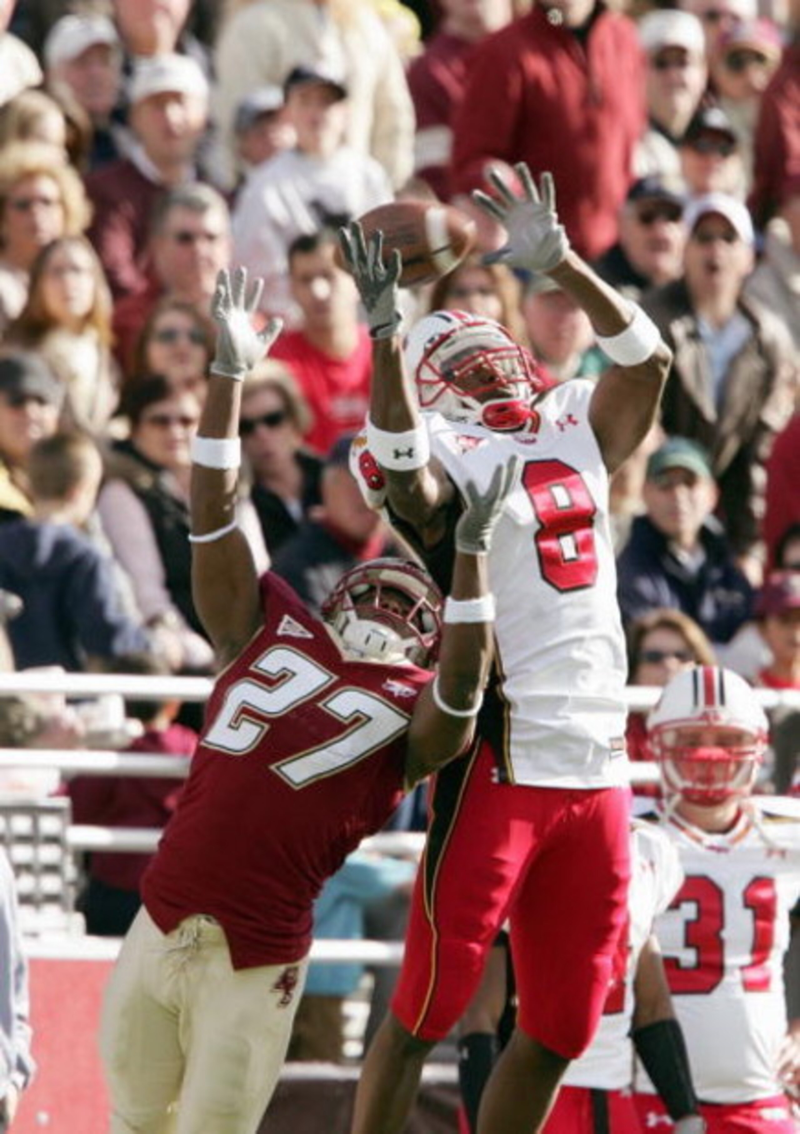 CHESTNUT HILL, MA - NOVEMBER 18: DeJuan Tribble #27 of the Boston College Eagles breaks up a pass intended for Darrius Heyward-Bey #8 of the Maryland Terrapins on November 18, 2006 at Alumni Stadium in Chestnut Hill, Massachusetts. (Photo by Elsa/Getty Im CHESTNUT HILL, MA - NOVEMBER 18: DeJuan Tribble #27 of the Boston College Eagles breaks up a pass intended for Darrius Heyward-Bey #8 of the Maryland Terrapins on November 18, 2006 at Alumni Stadium in Chestnut Hill, Massachusetts. (Photo by Elsa/Getty Im
