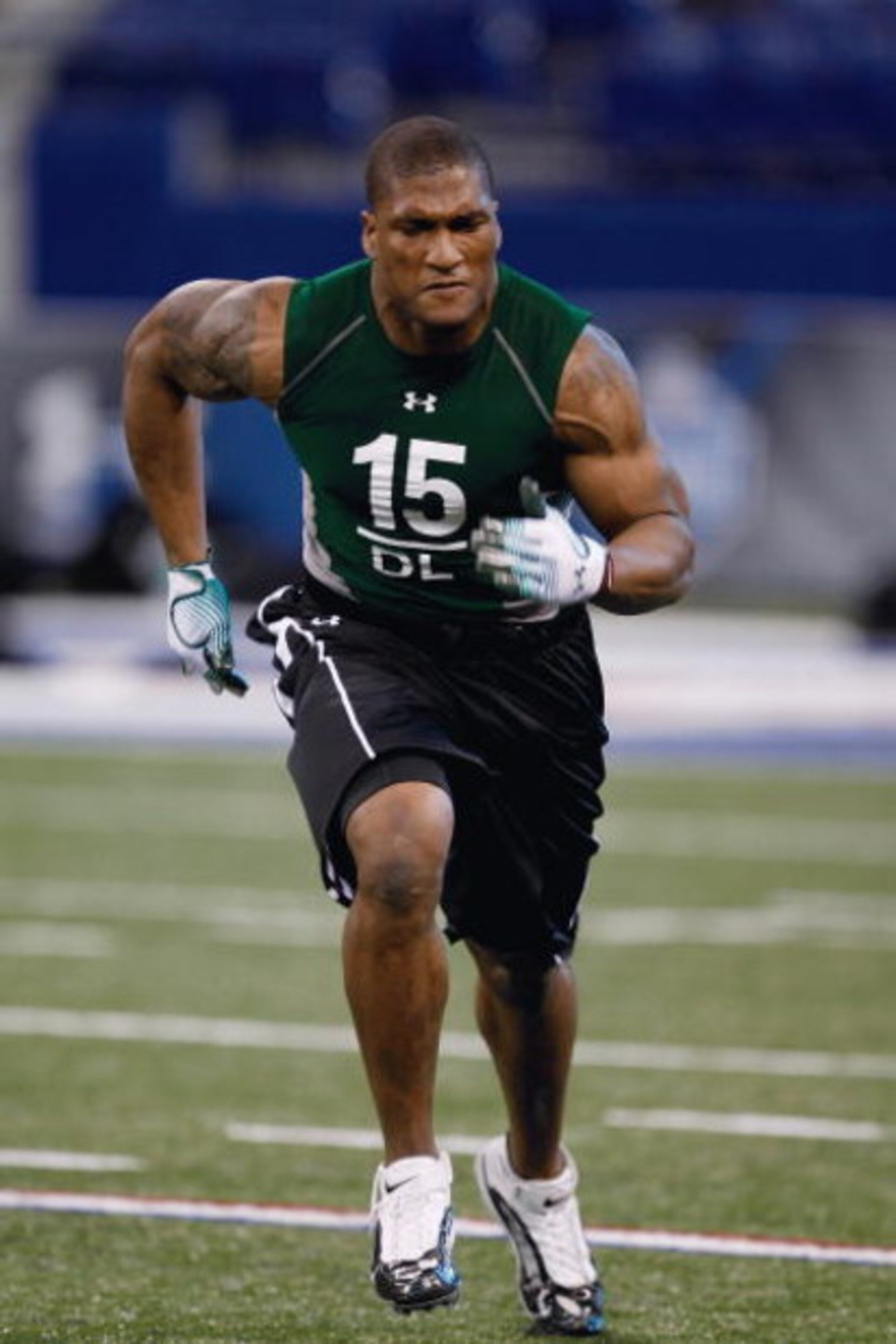 INDIANAPOLIS, IN - FEBRUARY 23: Defensive lineman Larry English of Northern Illinois runs during the NFL Scouting Combine presented by Under Armour at Lucas Oil Stadium on February 23, 2009 in Indianapolis, Indiana. (Photo by Scott Boehm/Getty Images) INDIANAPOLIS, IN - FEBRUARY 23: Defensive lineman Larry English of Northern Illinois runs during the NFL Scouting Combine presented by Under Armour at Lucas Oil Stadium on February 23, 2009 in Indianapolis, Indiana. (Photo by Scott Boehm/Getty Images)