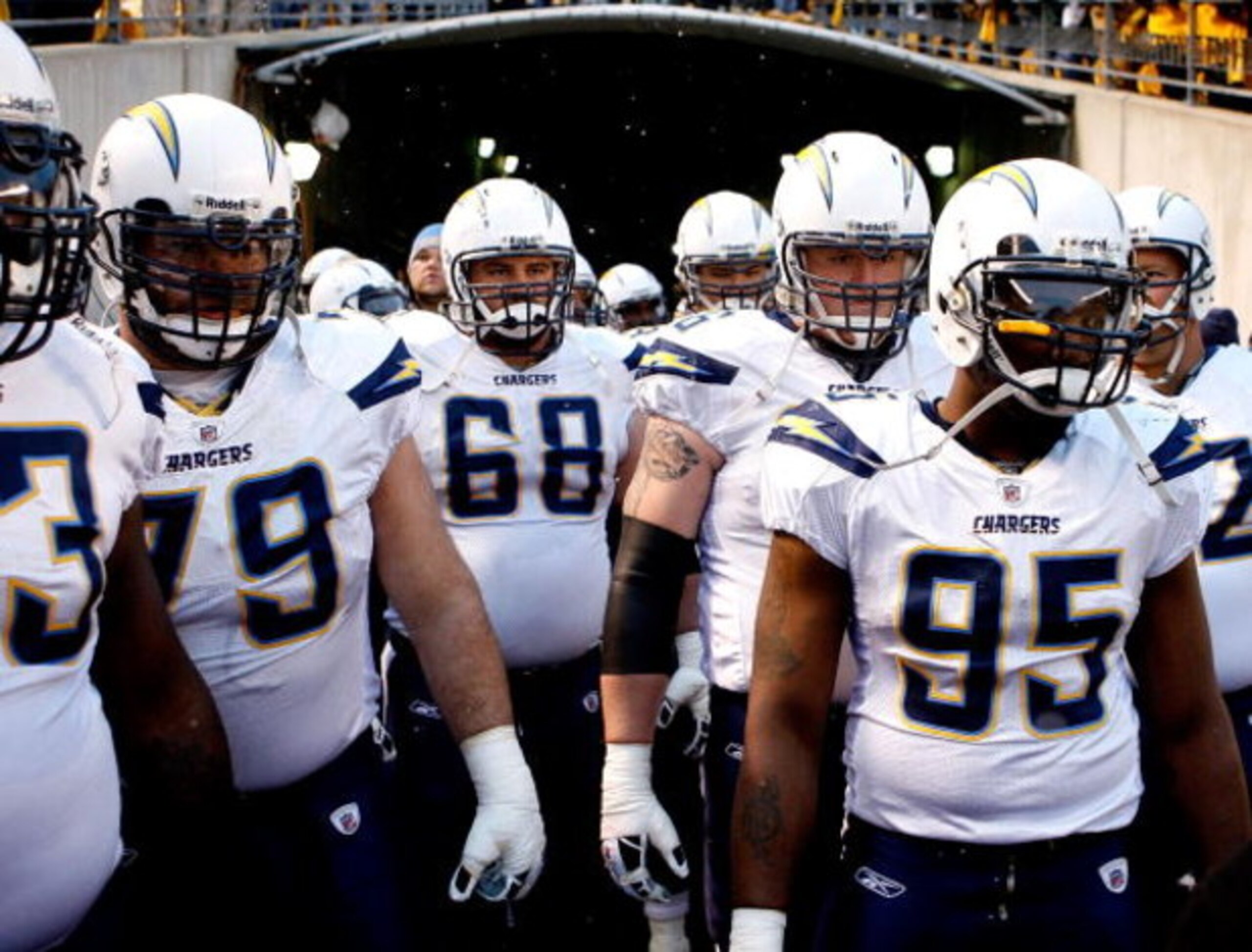 PITTSBURGH - JANUARY 11:  Mike Goff #79, Kris Dielman #68, Jeromey Clary #66 and Shaun Phillips #95 of the San Diego Chargers wait in the tunnel before taking the field against the Pittsburgh Steelers during their AFC Divisional Playoff Game on January 11