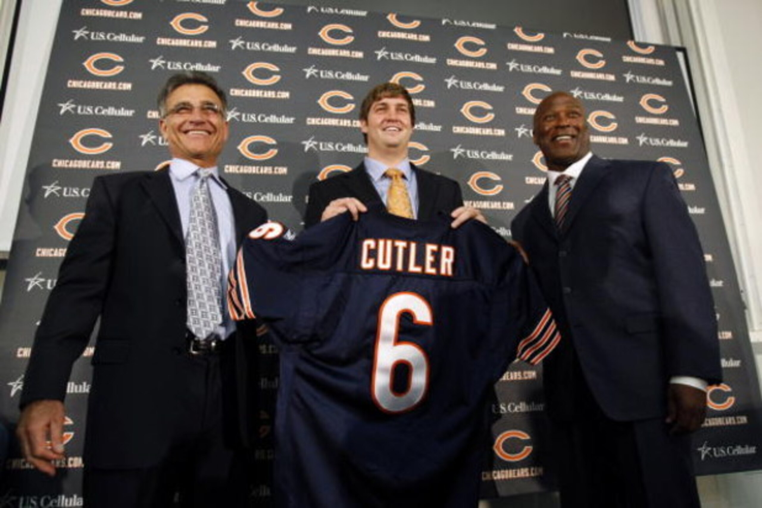LAKE FOREST, IL - APRIL 3:  Chicago Bears general manager Jerry Angelo, quarterback Jay Cutler and head coach Lovie Smith are all smiles after introducing Cutler as their new quarterback during a press conference on April 3, 2009 at Halas Hall in Lake For