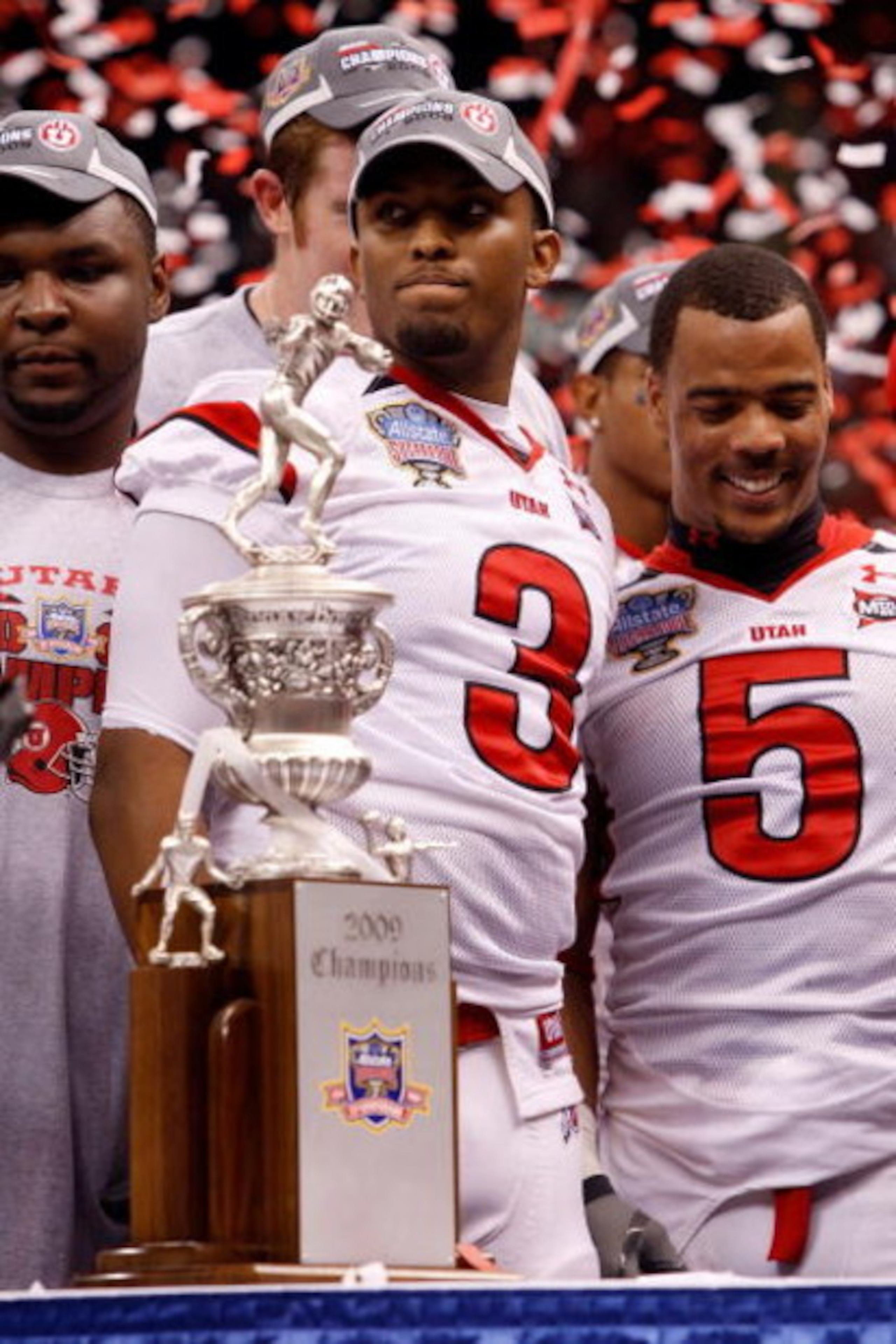 NEW ORLEANS - JANUARY 02:  (L-R) Quarterback Brian Johnson #3 and wide receiver Brent Casteel #5 of the Utah Utes celebrate after defeating the Alabama Crimson Tide 31-17 during the 75th Allstate Sugar Bowl at the Louisiana Superdome on January 2, 2009 in