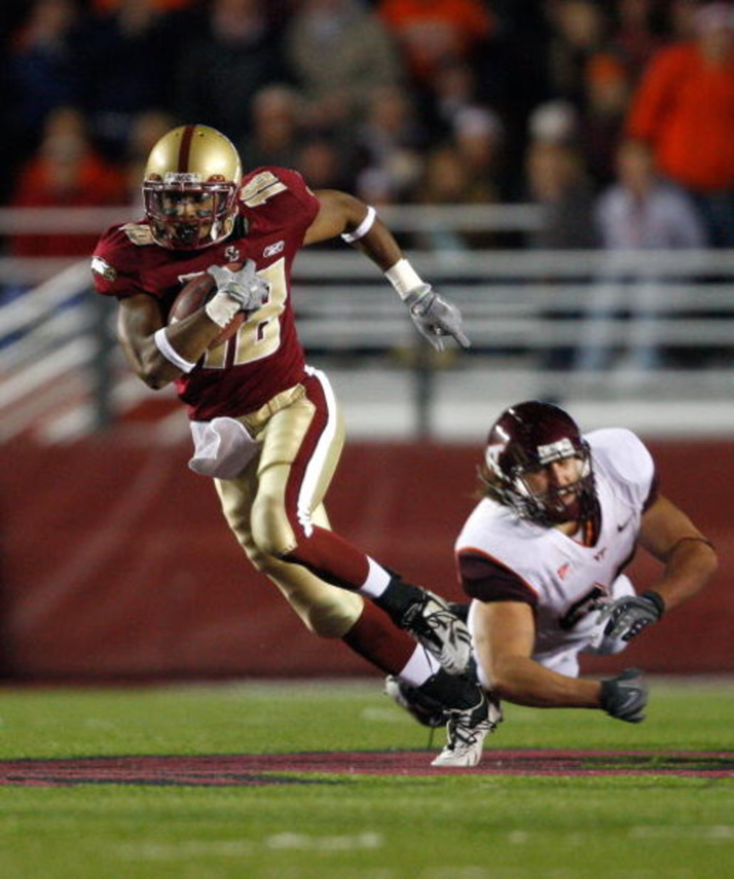 CHESTNUT HILL, MA - OCTOBER 18:  Rich Gunnell #18 of the Boston College Eagles runs a punt return for a touchdown against the Virginia Tech Hokies on October 18, 2008 at Alumni Stadium in Chestnut Hill, Massachusetts.  (Photo by Jim Rogash/Getty Images)