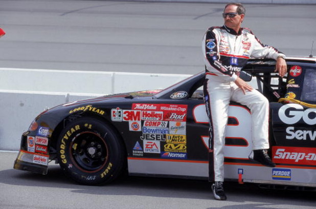 30 Apr 2000: Dale Earnhardt Sr. poses with his car during the NAPA Auto Parts 500, Part of the NASCAR Winston Cup Series, at the California Speedway in Fontana, California. Mandatory Credit: Jon Ferrey  /Allsport